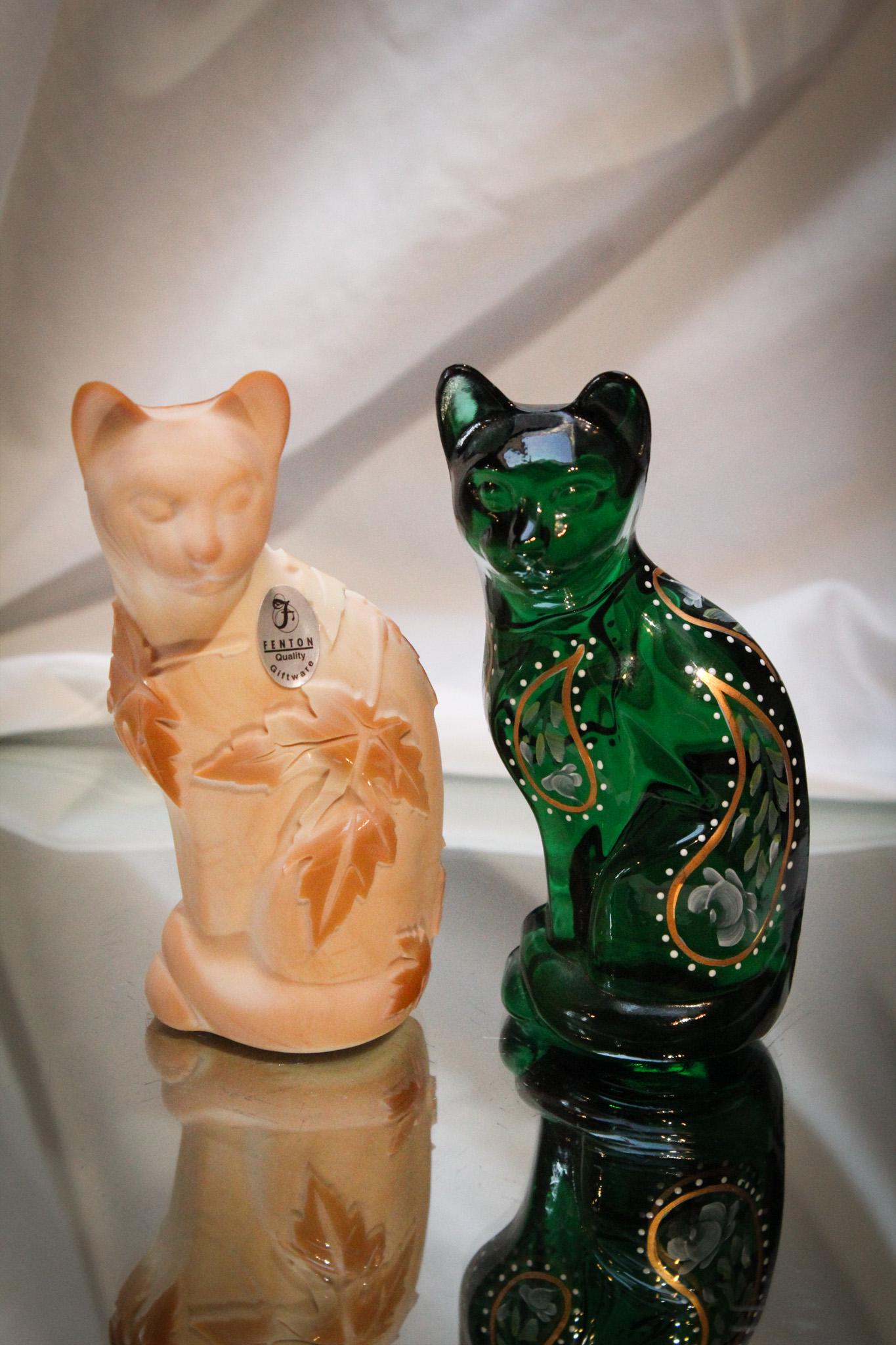 2 pc Lot Fenton Art Glass Stylized Cats: Just in time for the new year, we are offering two stylized Fenton Art Glass cats, one by Kelsey Murphy. Tallest measures 5" tall.