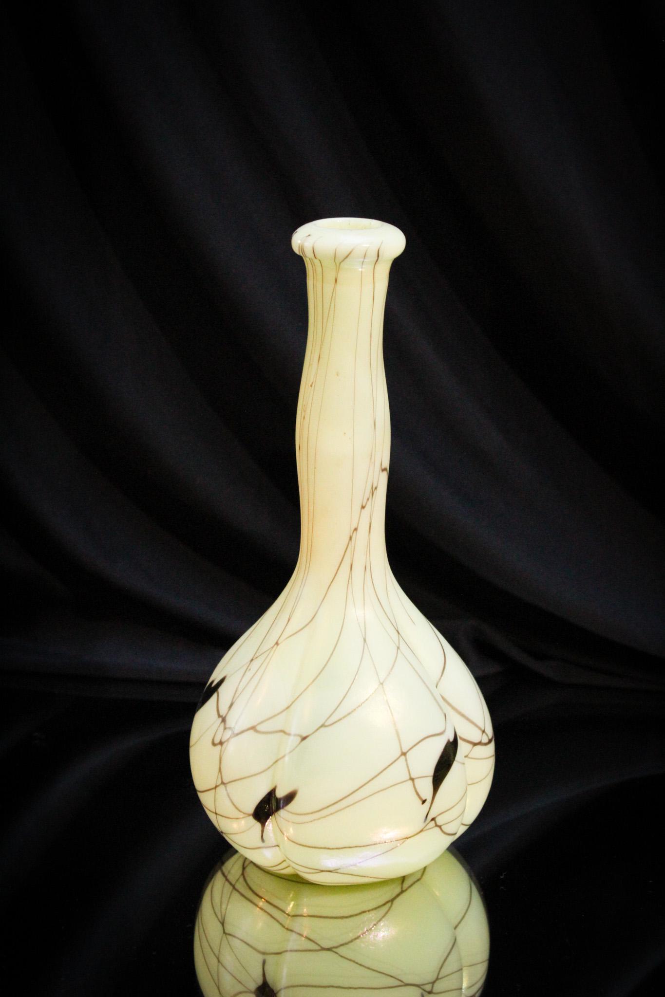 Fenton Custard Art Glass Hanging Hearts Barber Bottle: One nicety after another here at Magnum Auctions. This is just one example. A Fenton art glass custard barber bottle with hanging hearts decoration. So nice and seldom found.