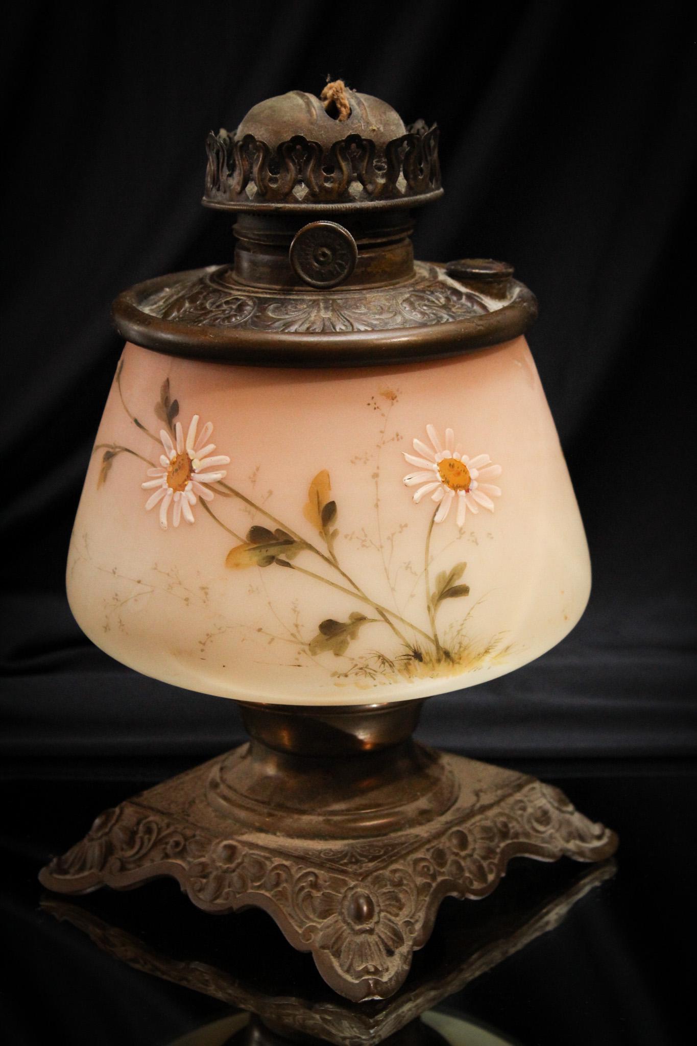 Mt. Washington Victorian Burmese Glass Oil Lamp Base: If you have the shade, you will have one amazing lamp! This wonderful lamp base is made by Mt. Washington. Their popular burmese glass makes up the font here. It is decorated with daisies around. Orig