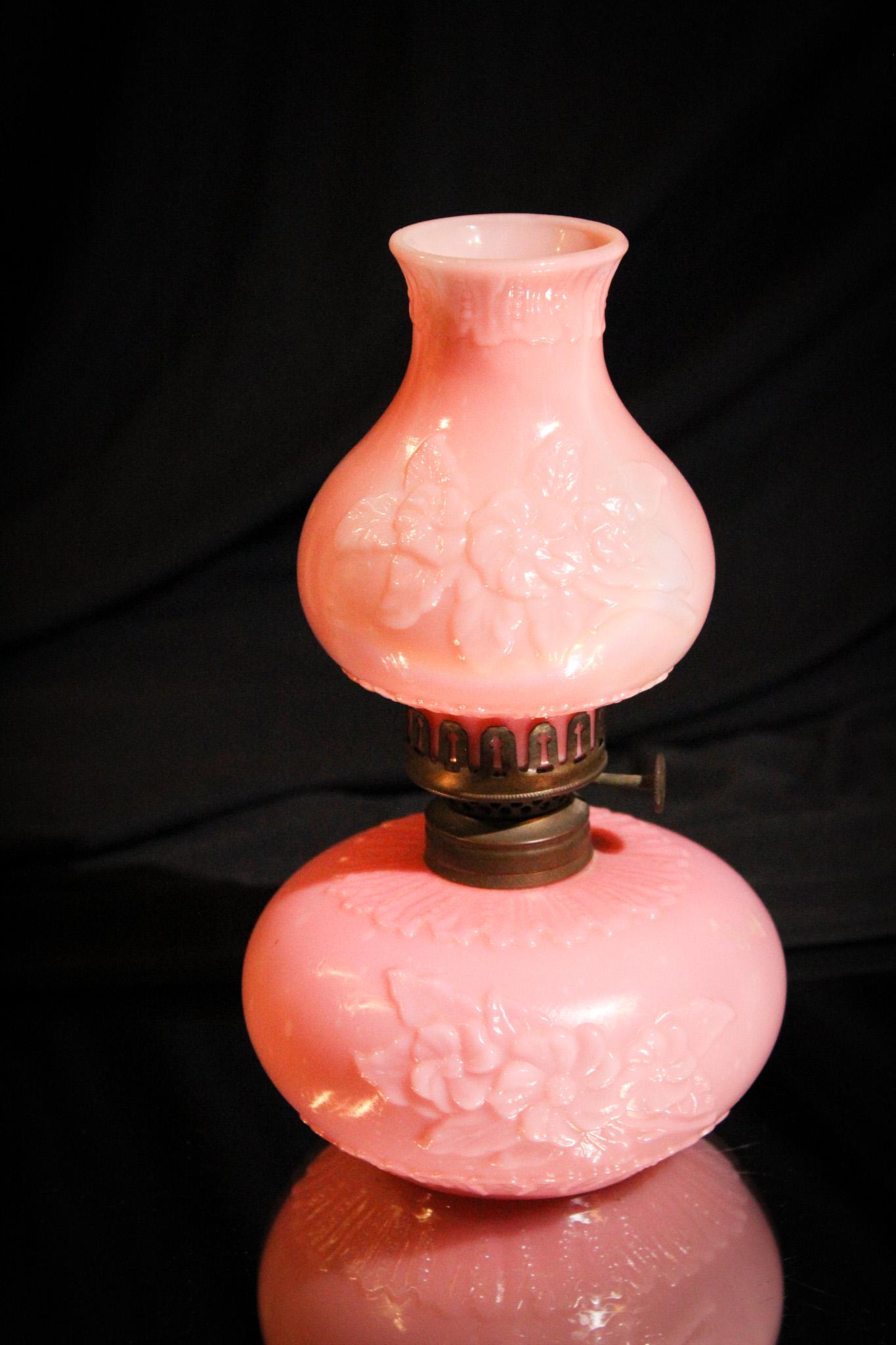 Victorian New Martinsville Miniature Oil Lamp: Nice, nice New Martinsville Victorian Miniature Oil Lamp. Example displays embossed florals. This charmer measures 7 3/4" tall.