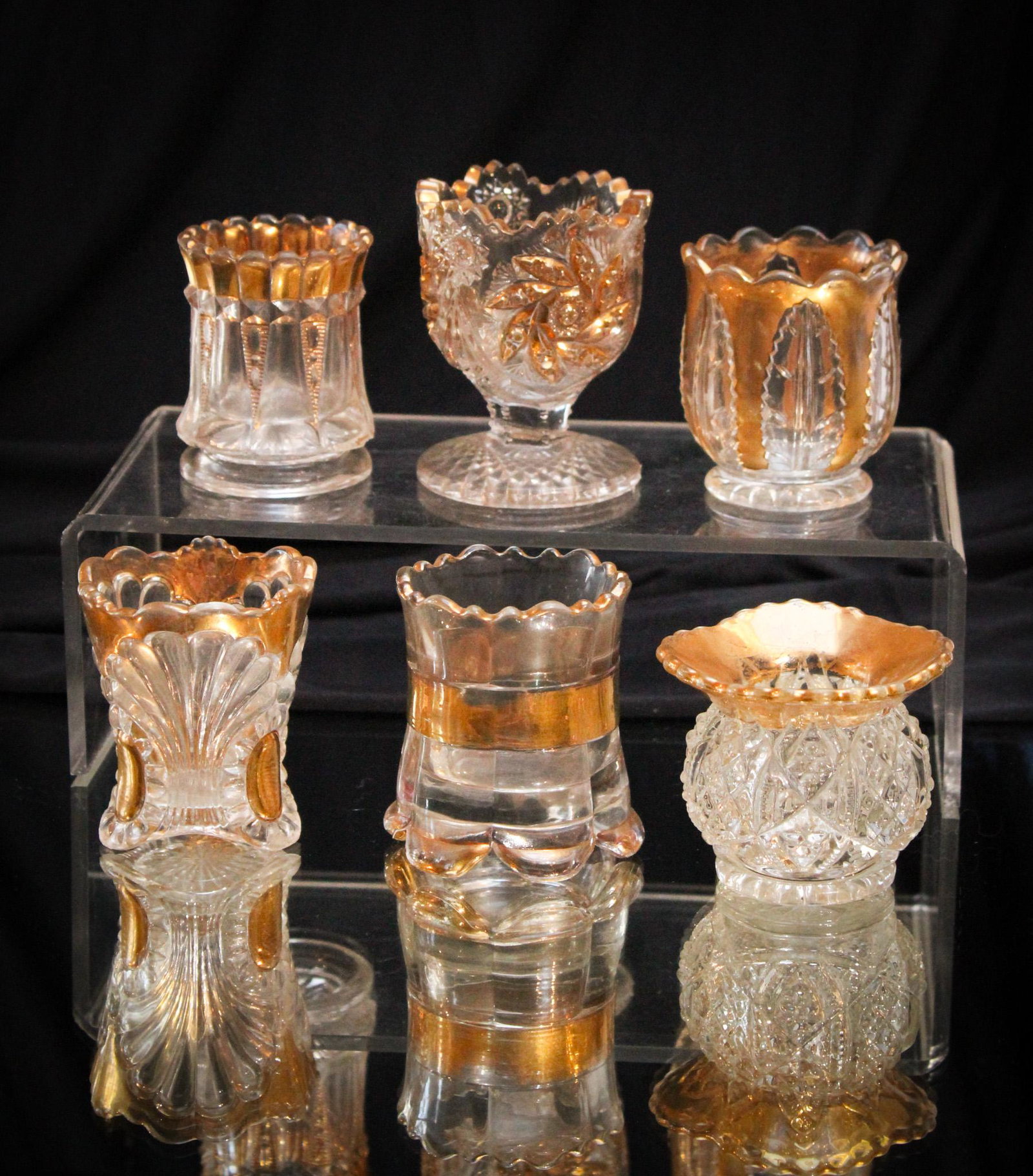 6 pc Lot Victorian Glass Holders for Toothpicks: One of the most awaited lots of the auction. This real gem of a lot offers so much and then maybe not, but none the less they are lovely. Lots of gold on these sparkling gems. Diamonds in the rough fo