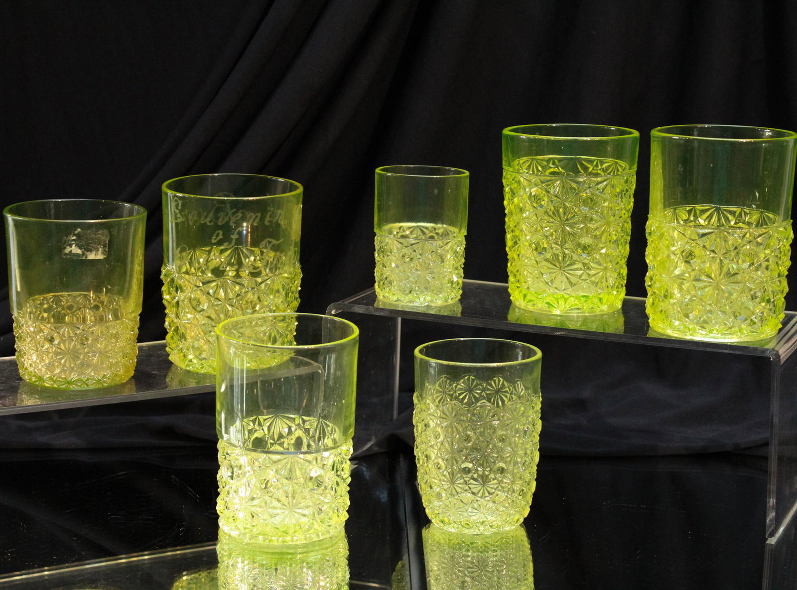7 pc Lot Vaseline Victorian Daisy & Button Tumblers: These just sparkle folks. They really do. And boy do they glow. Nice offering of 7 Victorian Daisy & Button tumblers. Each measures 4" tall.