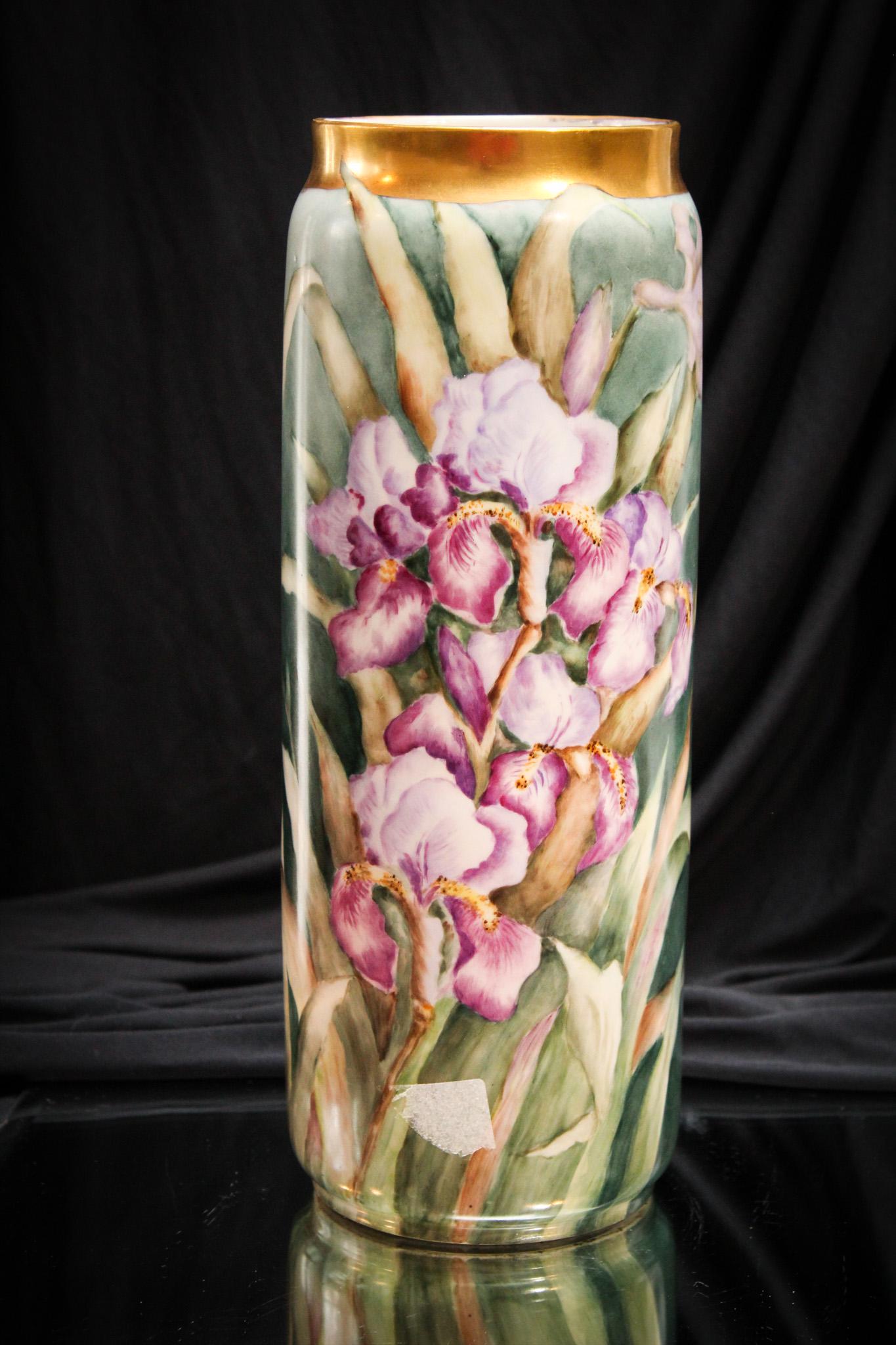 B & Co. Hand Painted Porceain Iris decorated Vase: We love iris and so does Edgar, our 104 year old Lighting director. He grows them ever year in his garden. His wife Gertie especially likes the bearded ones. Not the iris. Bearded men. Yep. She has a 