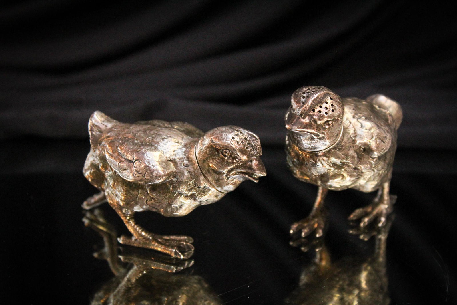 Pair of Sterling Chick Victorian Shakers: How charming are these little guys? Pair of sterling with hallmark figural chick shakers. Very detailed. Tallest measures 2 1/2".