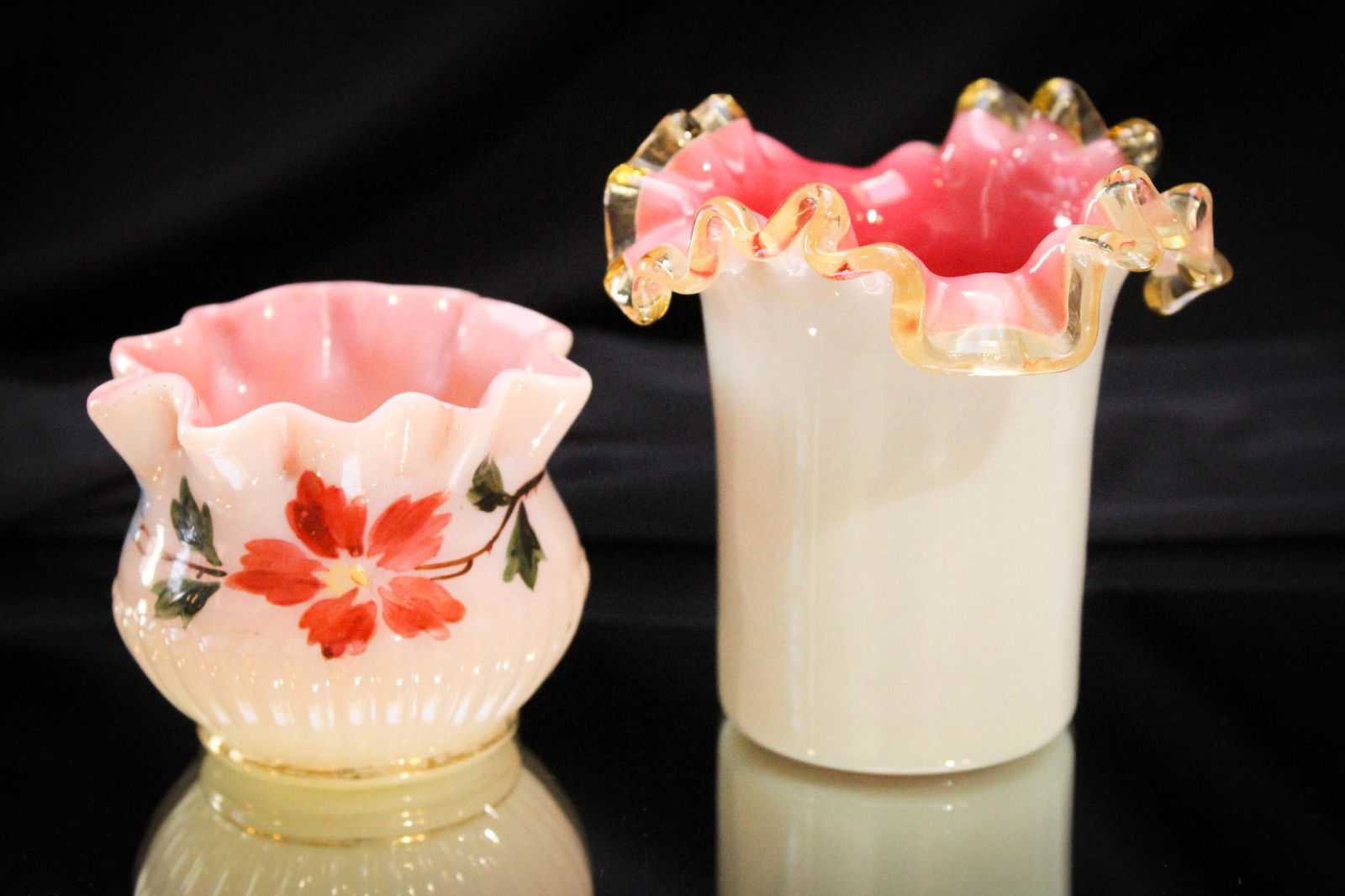 2 pc Lot Victorian Glass Toothpick Holders: Offered here are two nice Victorian glass toothpick holders. One with pleated base and enameling. The other with applied amber rim. Tallest measures 3" high.