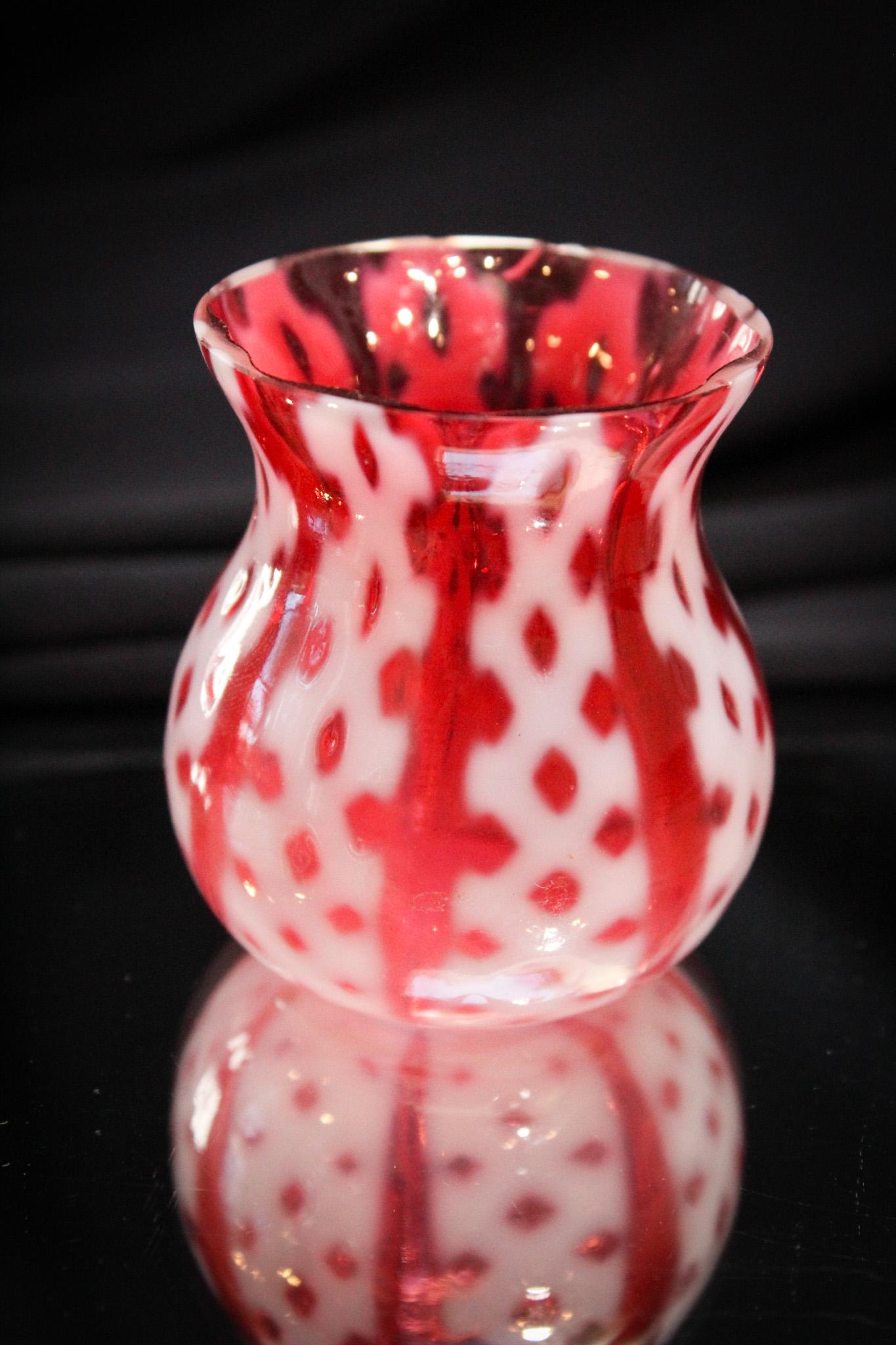 Cranberry Opalescent Criss Cross Victorian Toothpick Holder: This is a beautiful color and opalescent example of the Consolidated Criss Cross pattern. This is full height. And a nice example. It measures 2 1/2" tall.