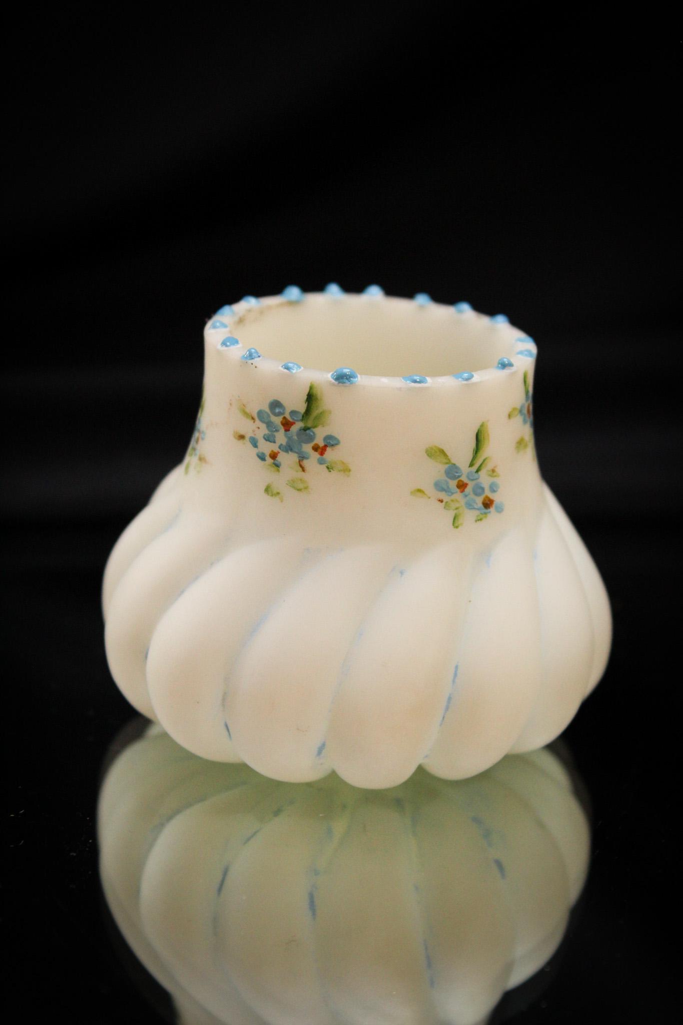 Mt. Washington Blue Floral Twist Victorian Glass Toothpick Holder: Another fine example of the wares produced by Mt. Washington glass. This toothpick is in the twist mold with shaded blue on lusterless white ground and dainty blue forget-me-not flowers. Nice! Measure