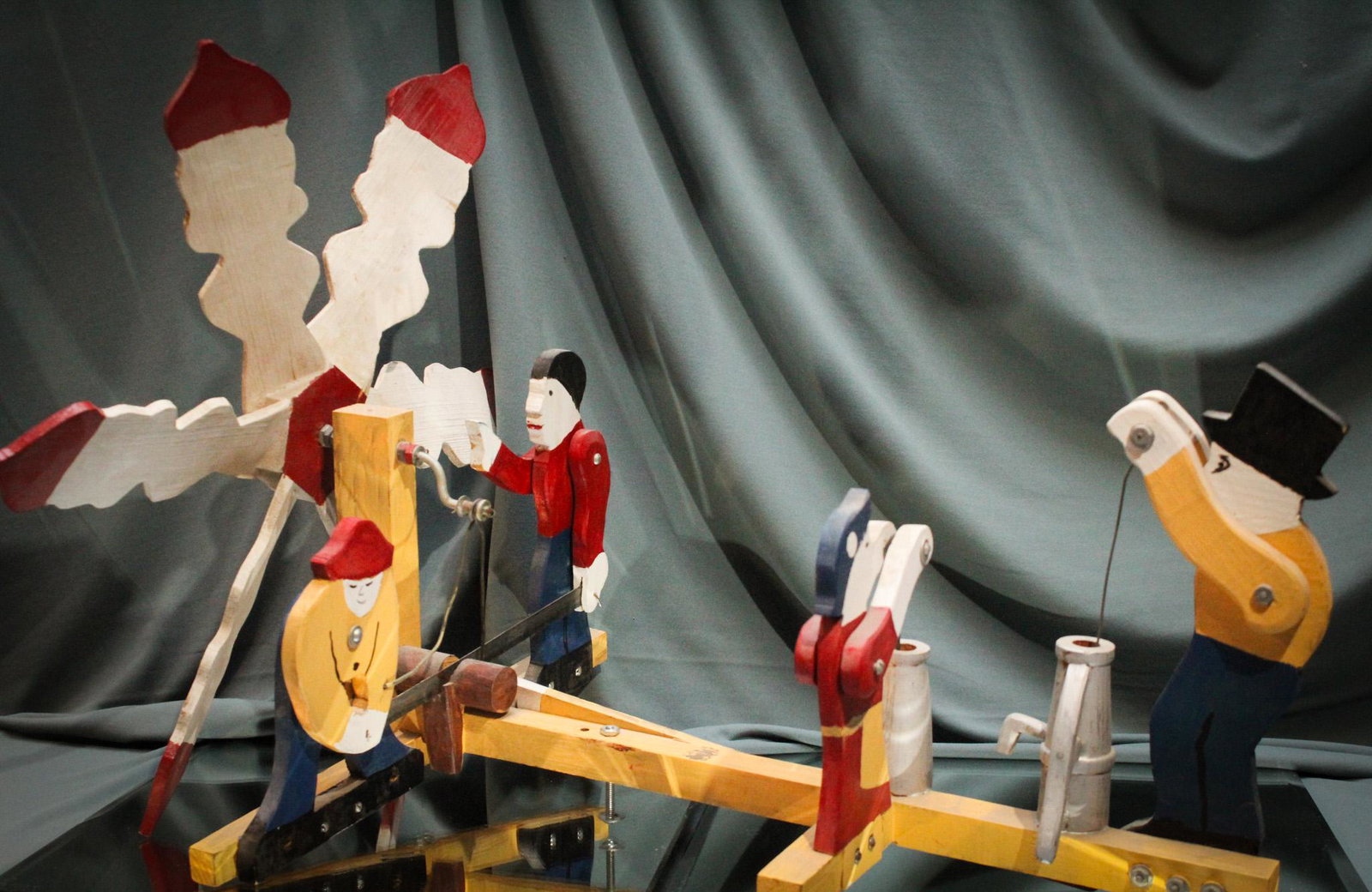 Folk Art Whirlygig 4 Men Pumping Water: Nice Folk Art Whirlygig of 4 men pumping. Measures 22" by 19".