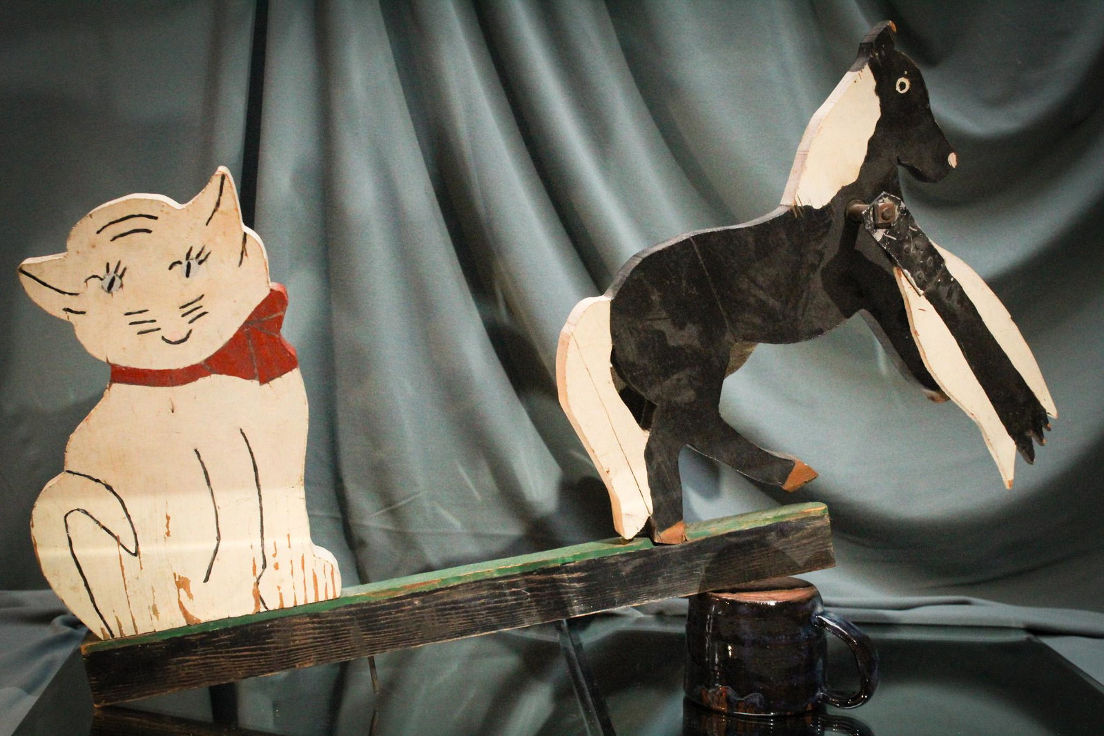 Folk Art Cat and Flying Horse Whirlygig: Unusual Folk Art cat and flying horse whirlygig. Measures 23" by 12".