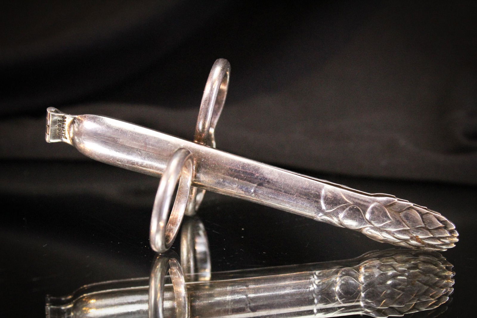 Christofle Silverplate Asparagus Tongs: Signed Silverplate Christofle asparagus tongs. Rarely found piece. Measures 4 1/2".