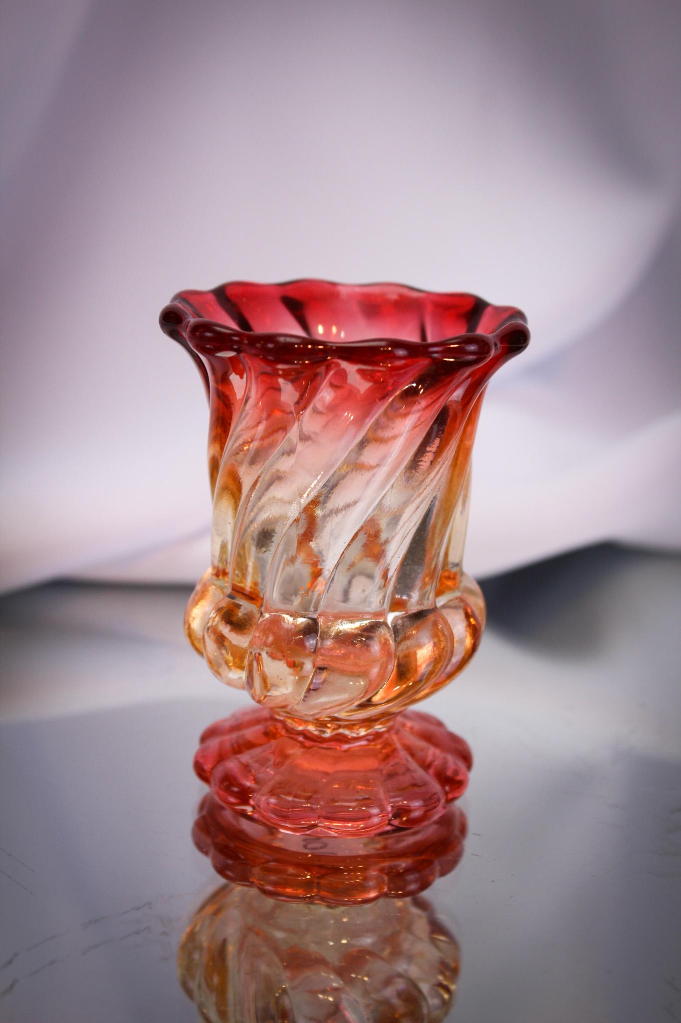 Baccarat Rose Tiente Swirl Toothpick Holder: These are always a find. Fine example of a Baccarat Rose Tiente Toothpick Holder in the swirl pattern straight out of an old woman. Measures 3" tall.