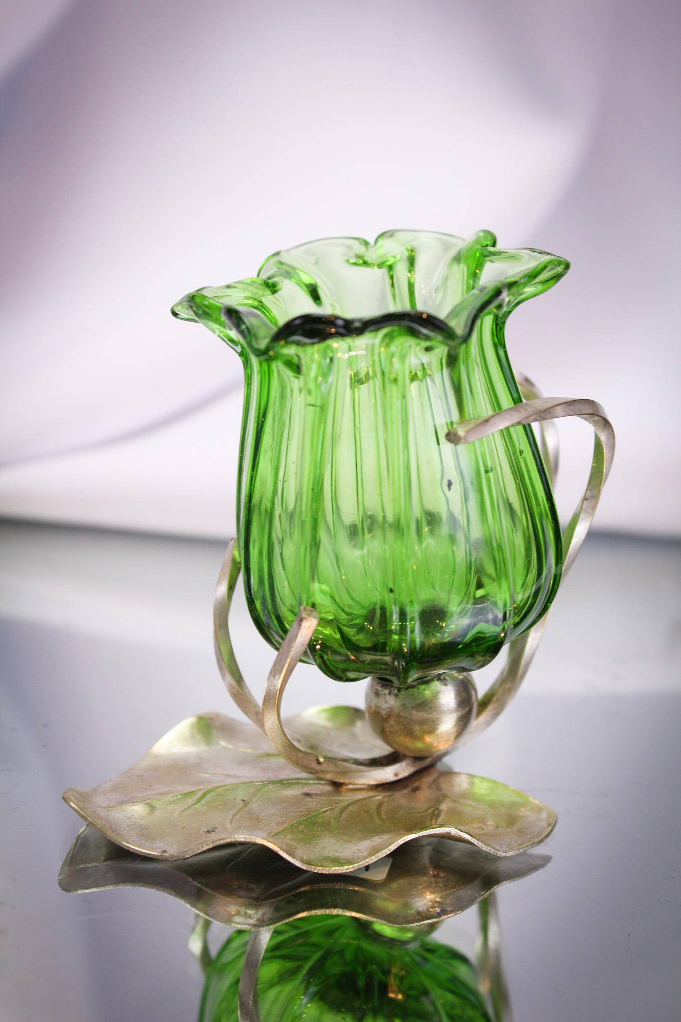 Victorian Green Floriform Toothpick Holder in Figural Frame: Fine example of a green floriform toothpick holder in wonderful figural holder. It measures a staggering 3" tall. Perfect for all you size queens out there.