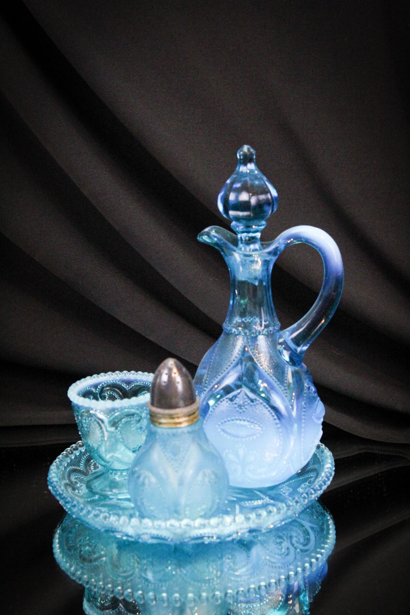 Blue Opalescent Victorian Glass Jeweled Heart Condiment Set: Another fine offering in the Jeweled Heart pattern in blue opalescent Victorian glass. This is the condiment tray with a single shaker, the cruet, and a toothpick holder. Shaker is satin finish. Compl