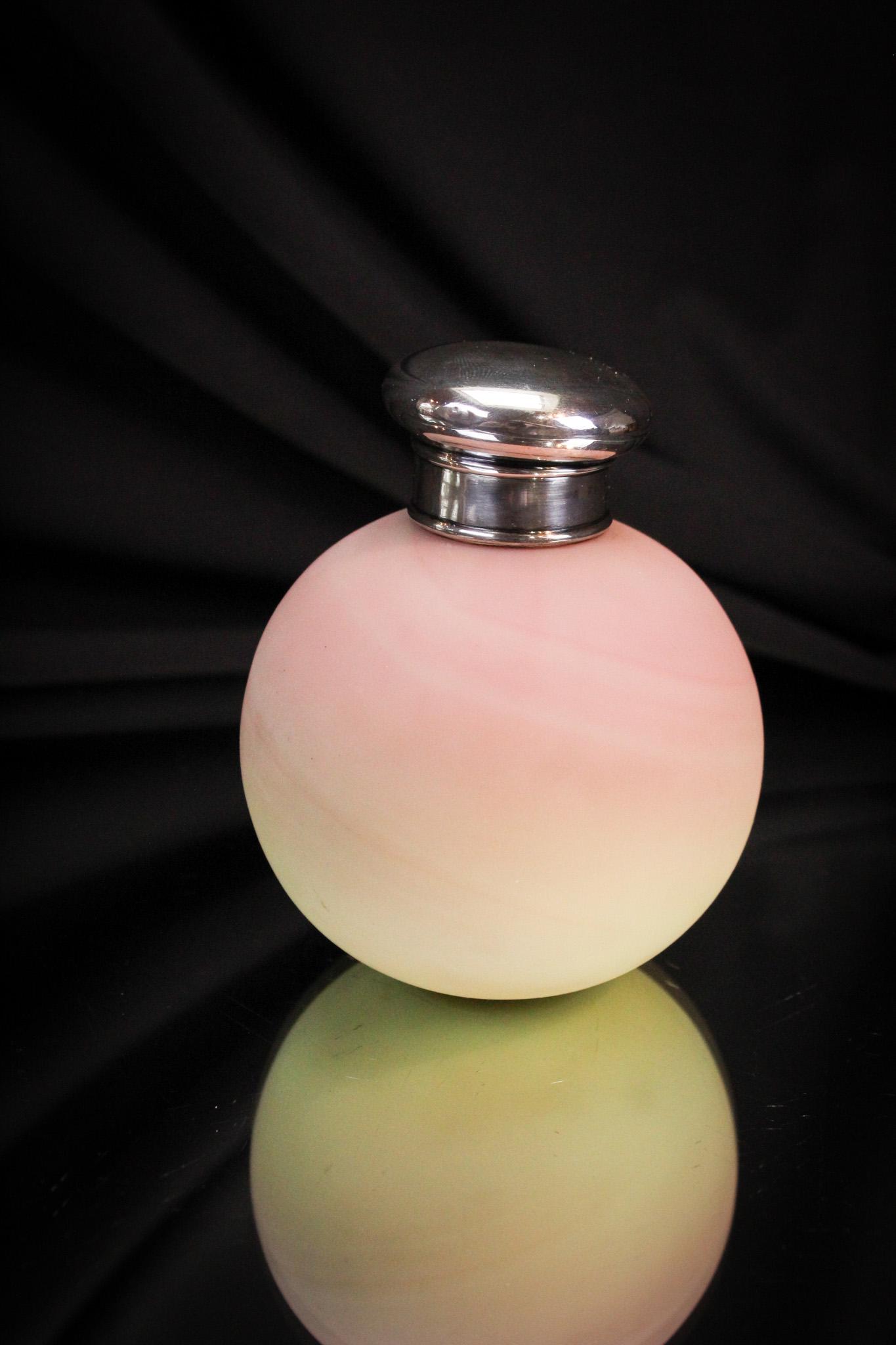 Victorian Webb Burmese Perfume with Sterling Top: The sterling top is the crowning glory of this Webb Burmese glass perfume bottle. Nice girth too. Height measures 4" tall.