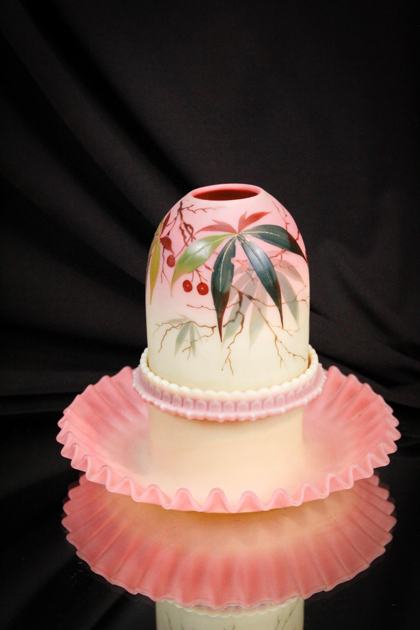 Webb Burmese Victorian Decorated Glass Fairy Lamp: Fabulous decoration is pronounced on the shade of this lovely Victorian fairy lamp. Base as well as the candle cup are also burmese glass. Nice example! Only the best here at Magnum Auctions!