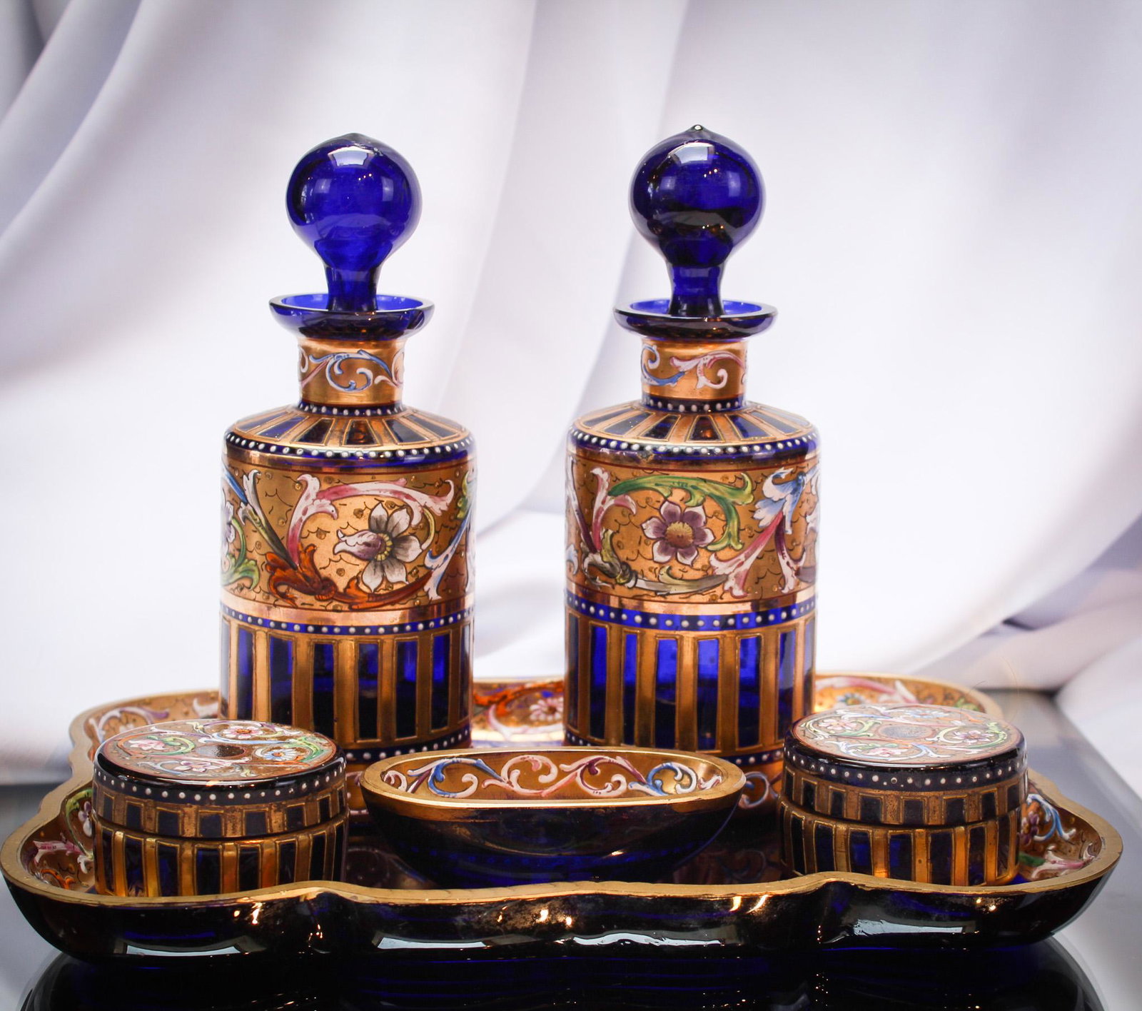 Moser Cobalt Victorian Vanity Dresser Set: Unbelievable dresser or vanity set in cobalt glass gilt and enamel decorated. Amazing! Set consists of 6 pieces.