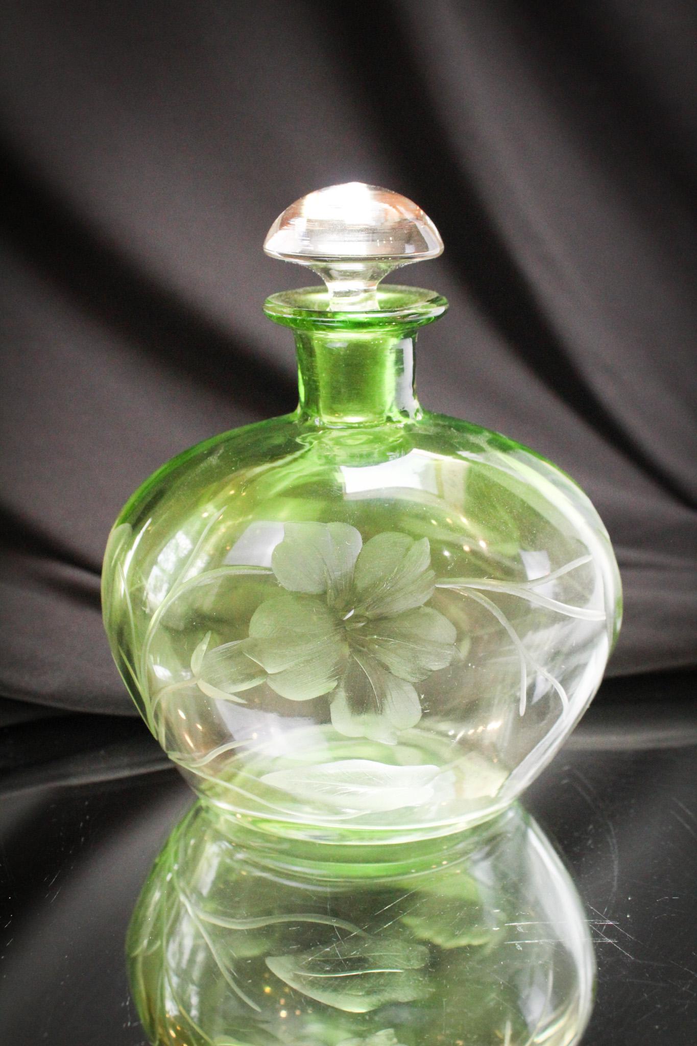 Signed Moser Green Intaglio Cut Glass Cologne: Gorgeous signed Moser green to clear intaglio cut glass cologne bottle with original stopper. Nice shaded coloring. Cologne measures 5 1/2" tall.