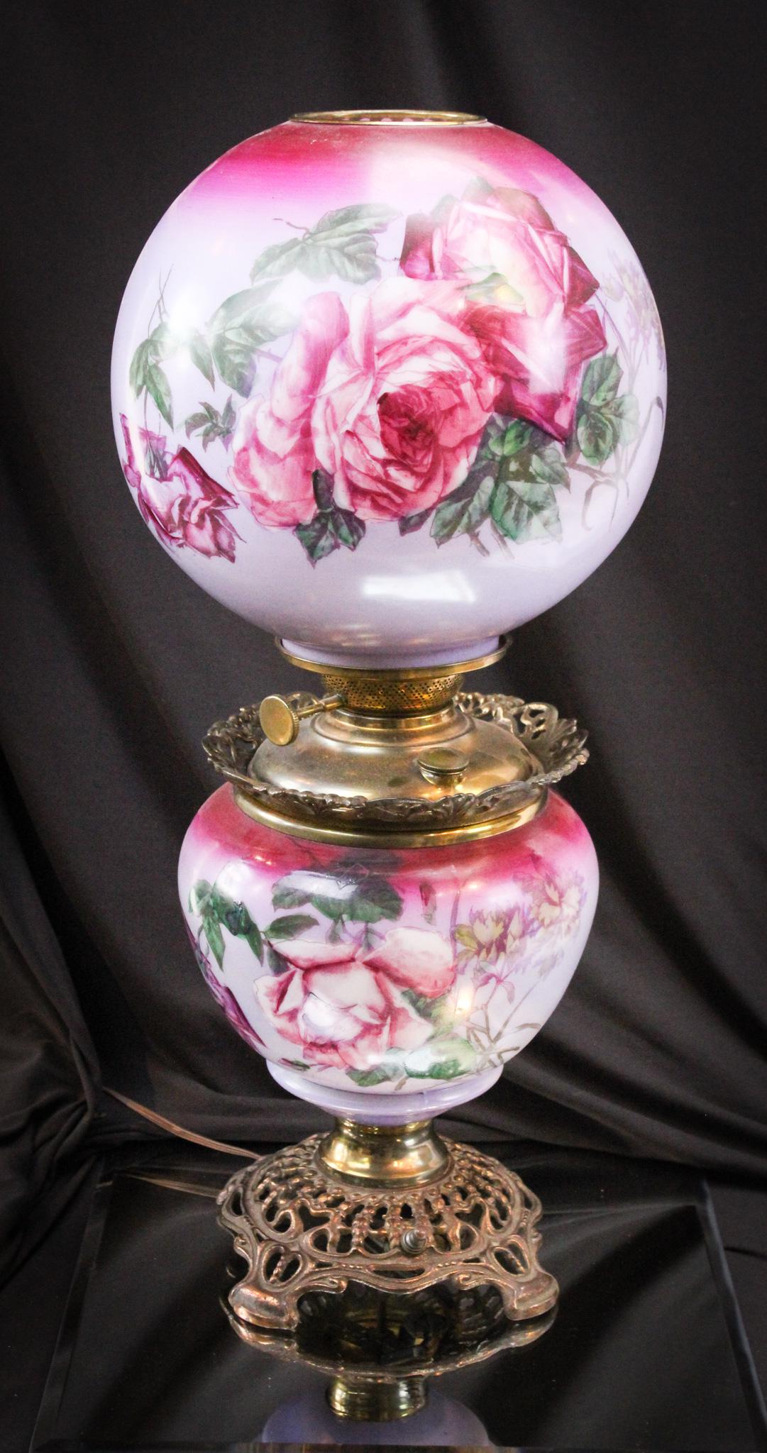 Cute Victorian Parlor lamp: Nice old used parlor lamp with rose decoration. Nice size at 23" tall. Lamp has been electrified.