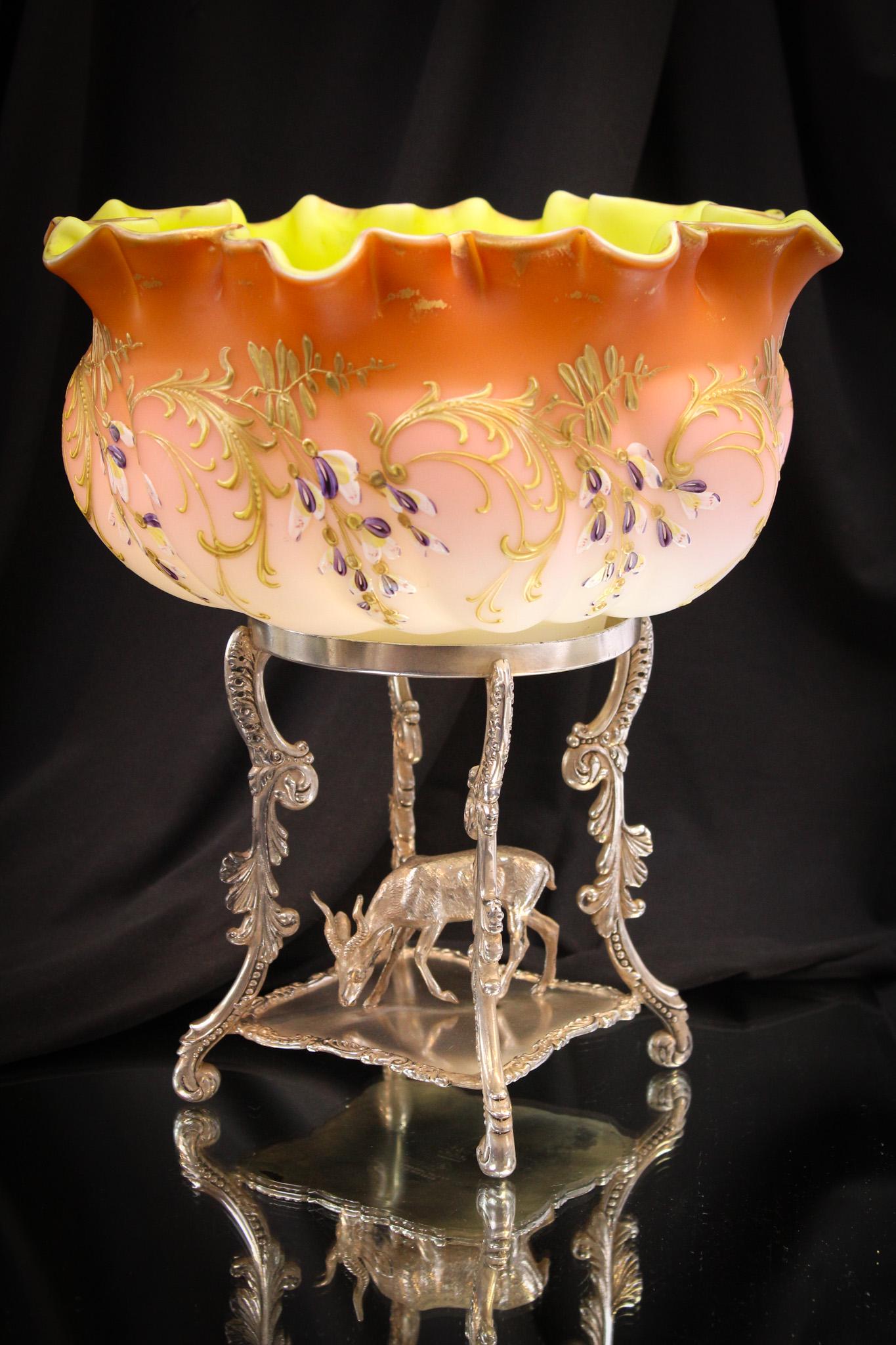 Figural Pairpoint Silverplate Art Glass Harrach Brides Bowl Centerpiece: How super is this fantastic brides bowl centerpiece? Signed Pairpoint holder with figural gazelle on the base and shaded peach colored enameled and gilt decorated melon form bowl. It stands 11 1/2" ta