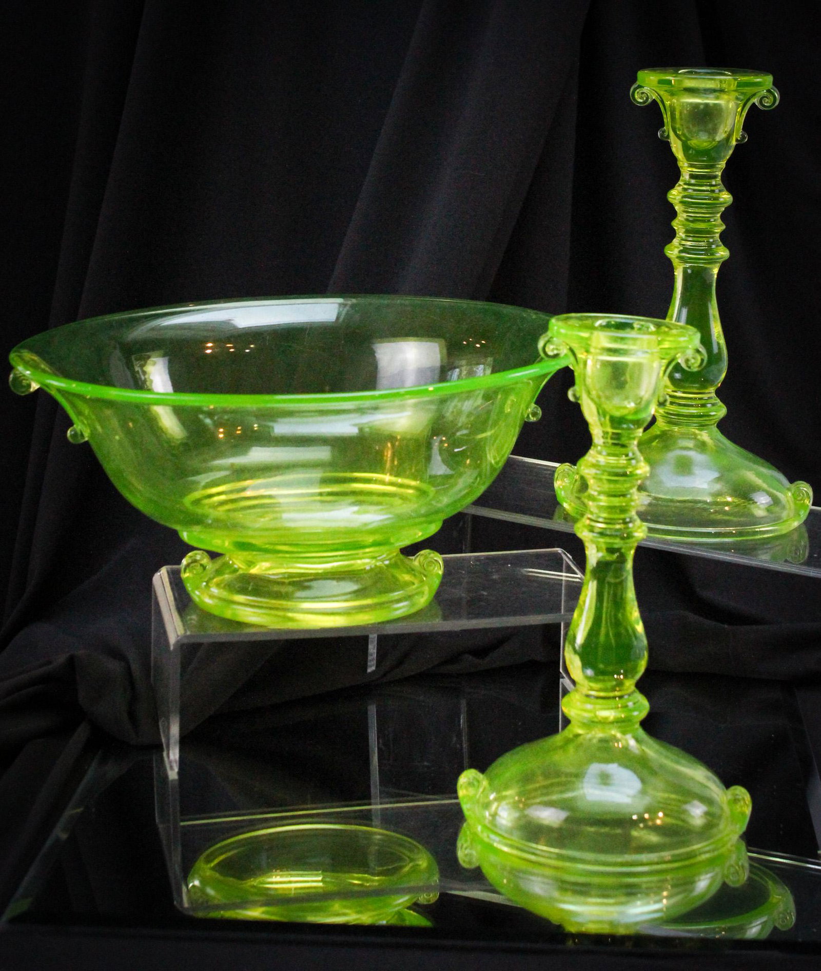 3 pc Vaseline Imperial Glass Double Scroll Console Set: Great offering for all of you Vasies out there! A three-piece console set in Imperial vaseline Double Scroll pattern. Set is comprised of a bowl and pair of candle holders. Tallest measures 8 1/2".