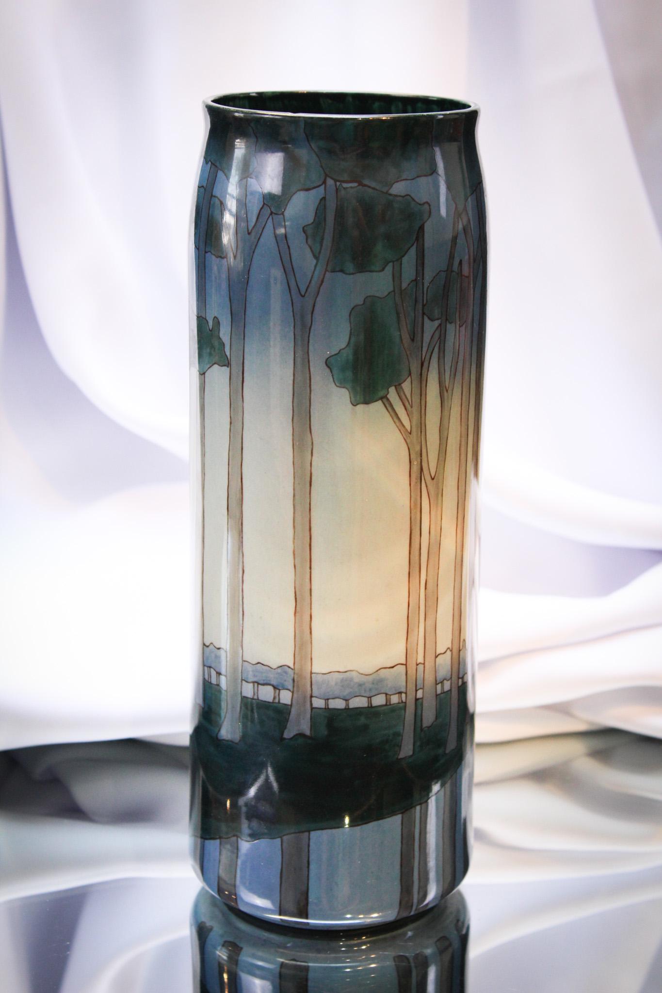 Lenox Belleek Scenic Landscape Cylinder Vase: Gorgeous decorated hand painted Lenox belleek cylinder vase measuring 11" tall. This vase is quite striking with landscape scenic decoration. Nice piece!