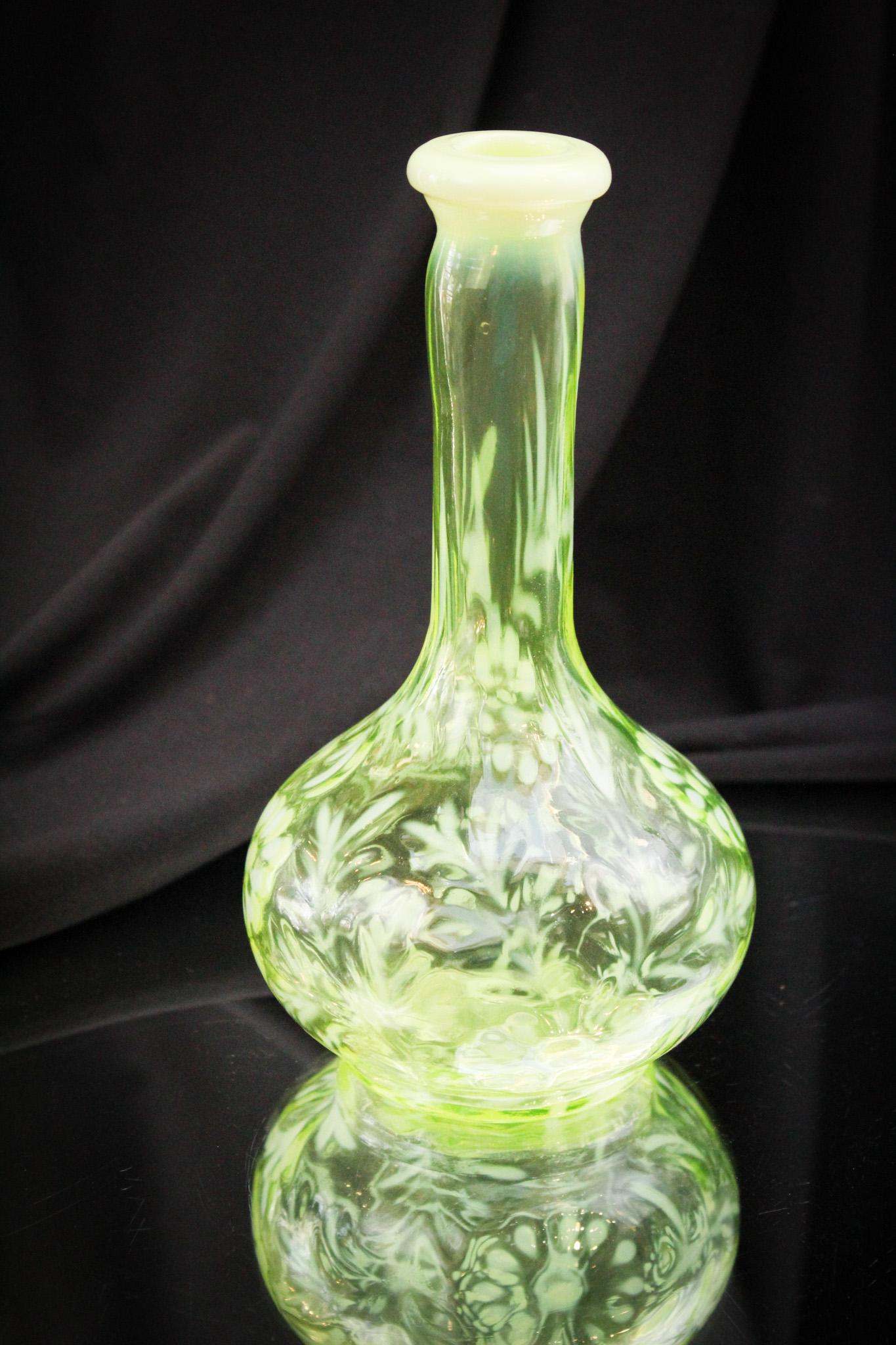 Vaseline Opalescent Daisy & Fern Barber Bottle: Super example if you need one vaseline opalescent barber bottle in the Daisy & Fern pattern. Boy, does this thing light up under black light! It measures in at 7 1/2" tall.