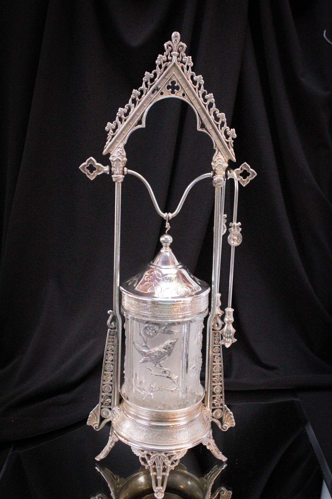 Reed & Barton Victorian Silverplate Pickle Castor: Fine example of the best silverplate made by Reed & Barton. This castor is complete with the original insert. It measures a staggering 16 1/4" tall. Wow!