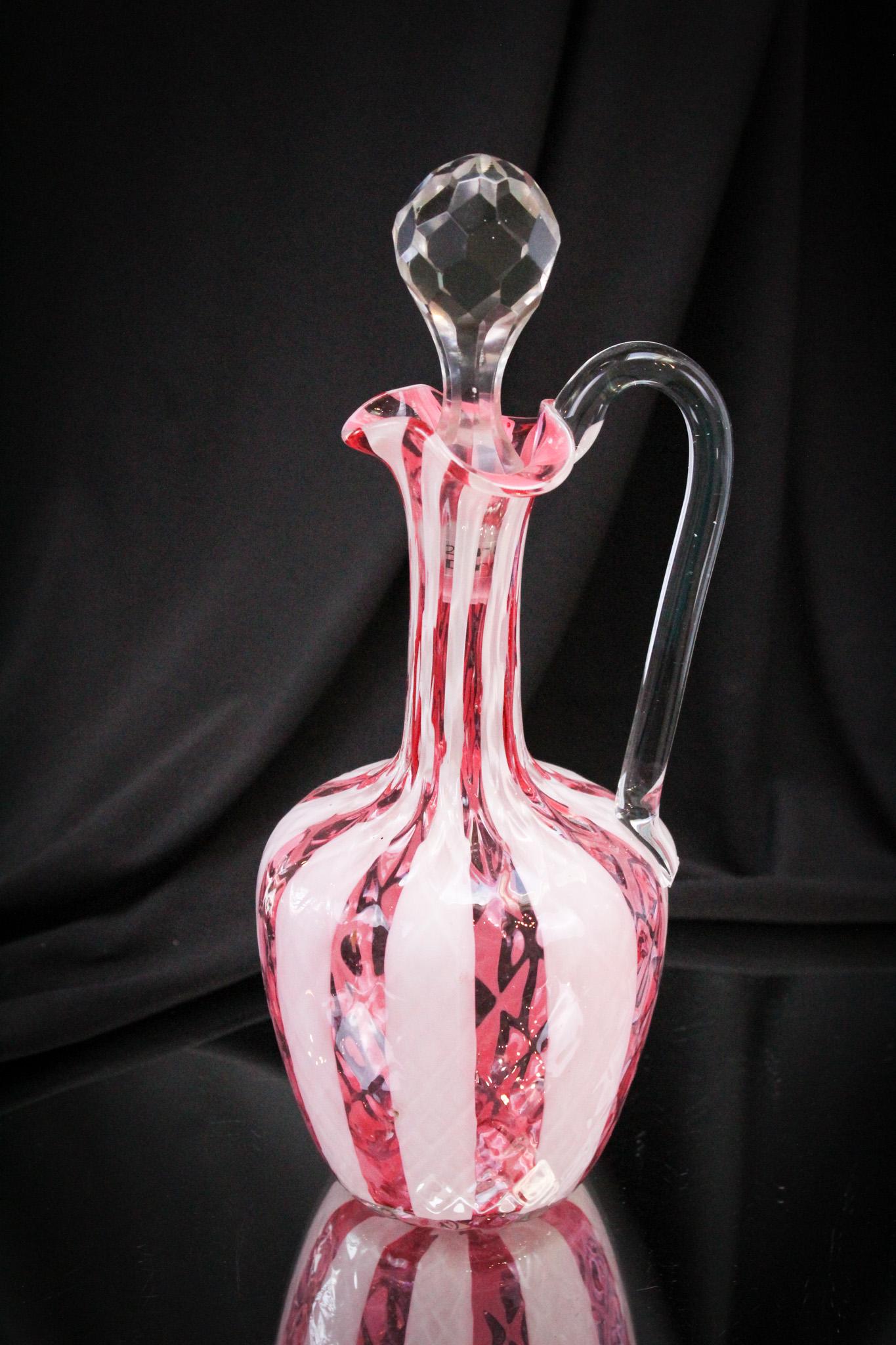 Cranberry Diamond Quilt Wide Stripe Decanter: Beauty is in the eye of the beholder and there is no doubt that this is one beautiful decanter. Victorian glass at its best. It stands 10" tall.