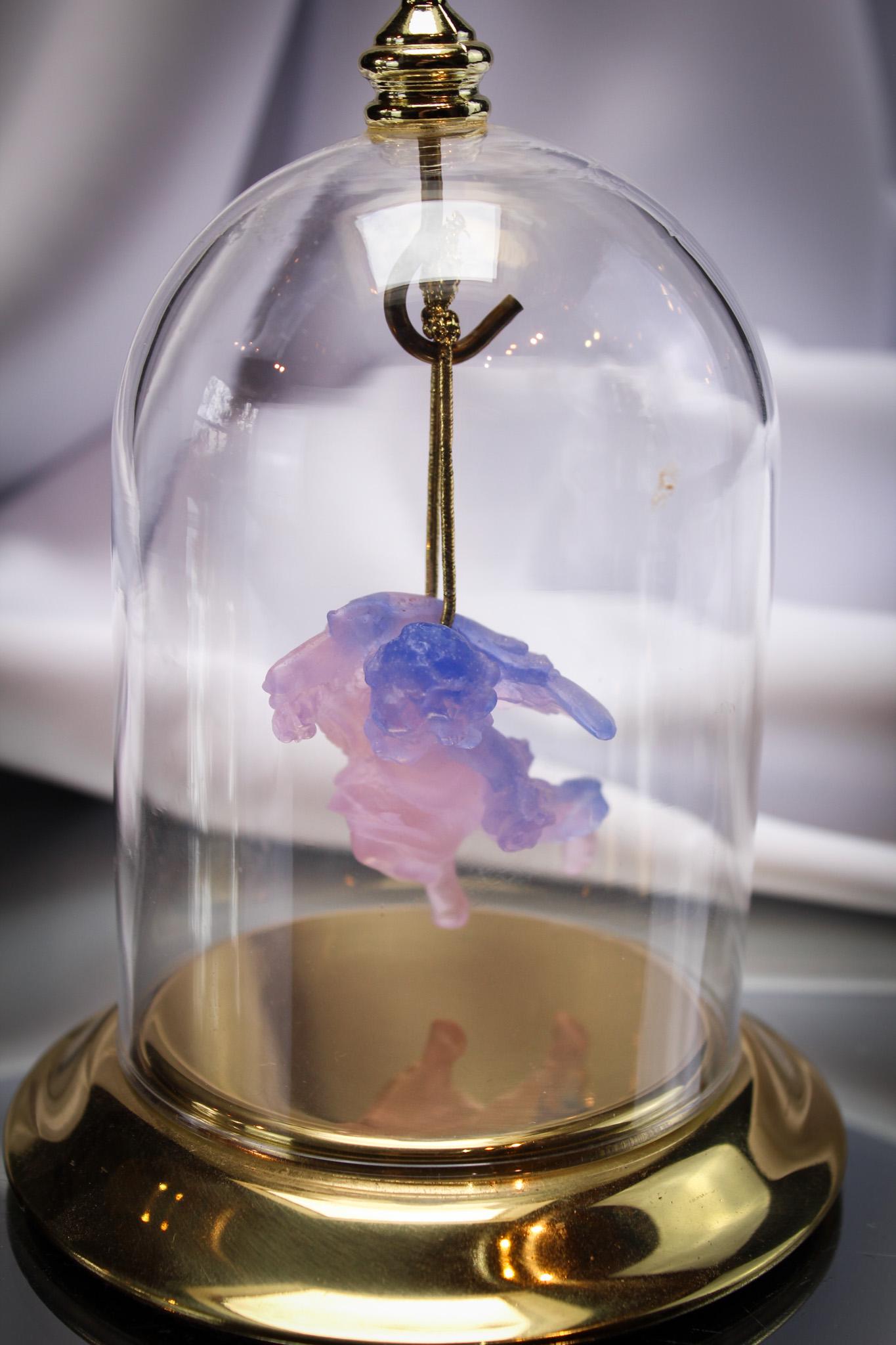Daum France Pate-de-Verre Cherub Ornament in Glass Dome: Seldom found, this is a beautiful Daum France cherub Pate-de-Verre ornament complete with glass dome for display. Measures complete about 3 1/2" tall.