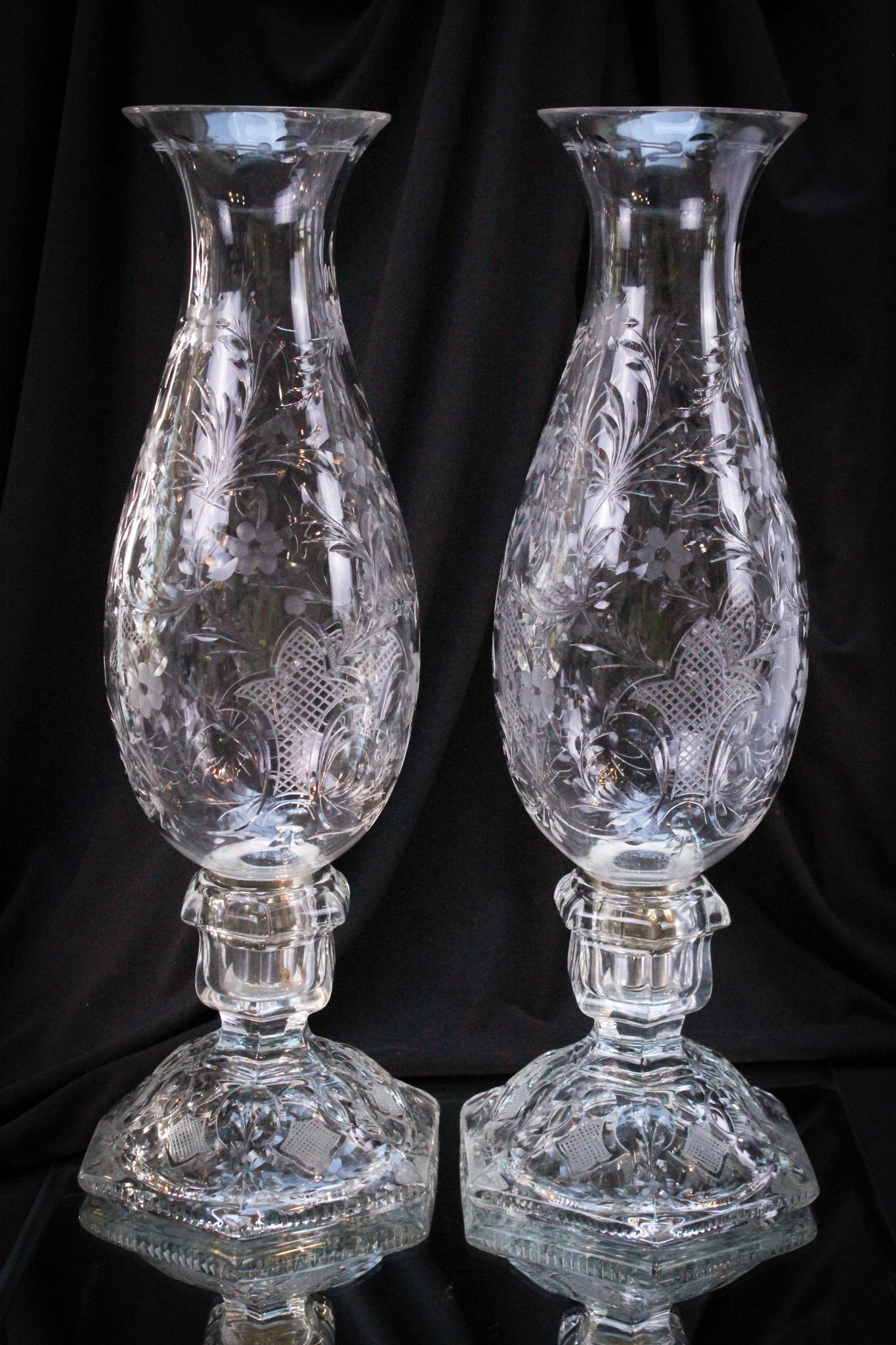 Heisey Engraved Hurricane 16" Lamps: Amazing pair of Heisey engraved hurricane lamps. Now these are something special! Look at the amount of work that went into making these lovelies. Each measures 16" tall of pure loveliness.