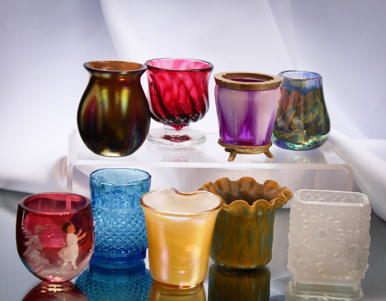 9 pc Mega Magnum Auctions Lot of Contemporary Toothpick Holders: Mega Magnum Auctions lot of contemporary art glass toothpick holders. Each unique. Tallest measures 2 1/2".