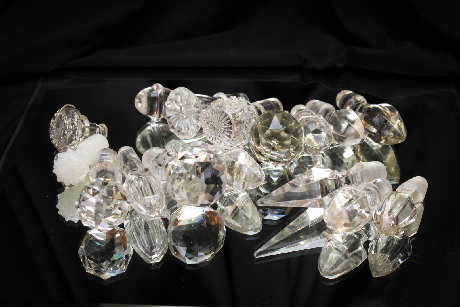 16 pc Mega Magnum Auctions Lot Glass Stoppers: Hand selected by our Grand Old Dame herself, Mother Magnum. She swept her arm across the shelf clearing off these stoppers, allowing them to fall into the hand picked tray lot you see here today. Our 