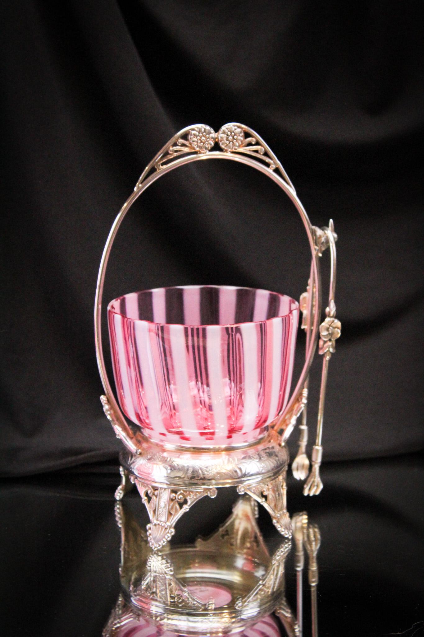 Rogers Silverplate Victorian Cranberry Opalescent Sweetmeat: What a killer and fine piece of Victorian Silverplate this sweetmeat castor is! Frame is signed Rogers silverplate. It stands 10" tall.