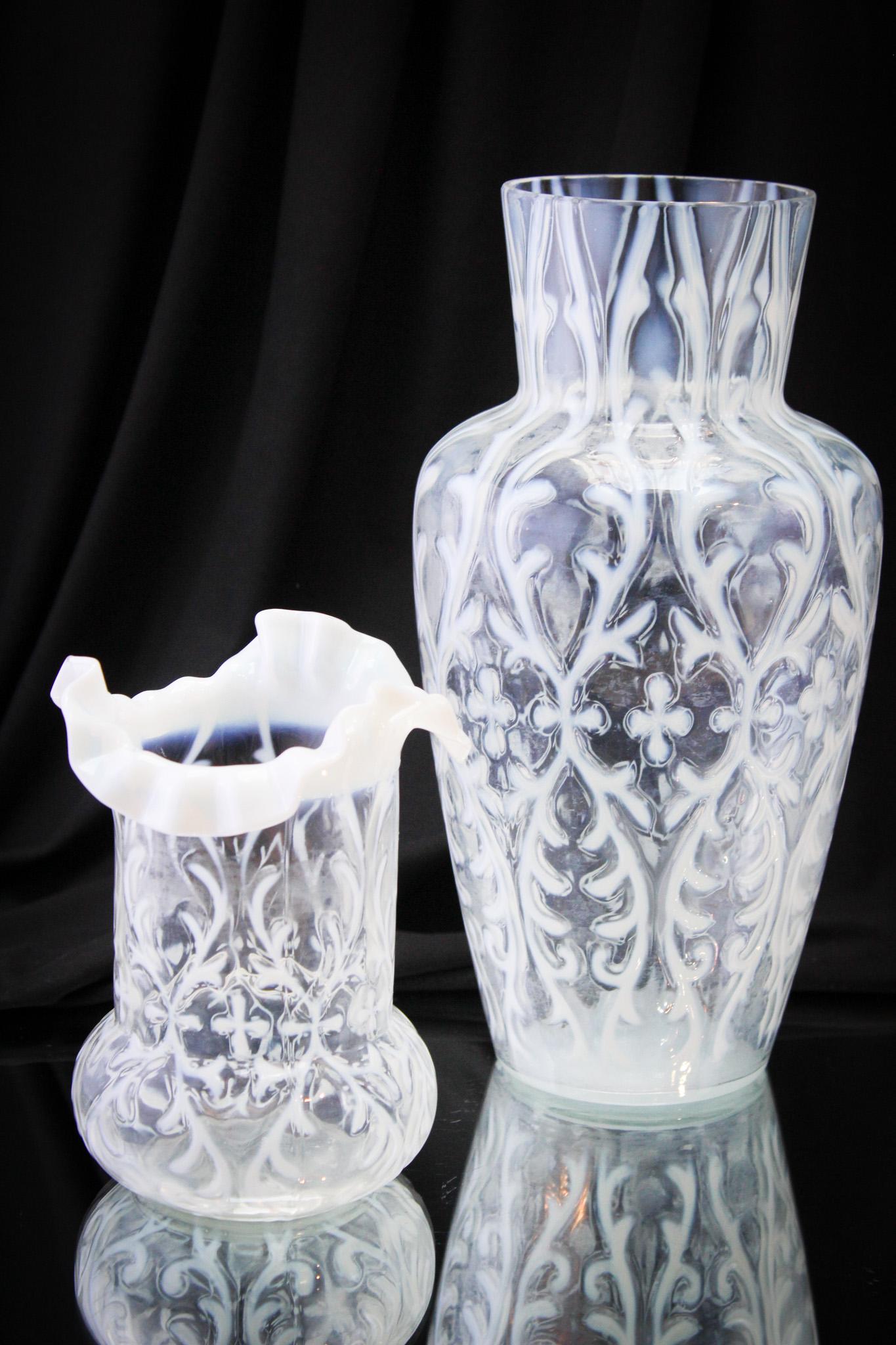 Northwood Opalescent Spanish Lace Vases: Select offering of two Northwood Victorian opalescent Spanish Lace pattern in the large vase and also the celery vase. Tallest measures 10 3/4".