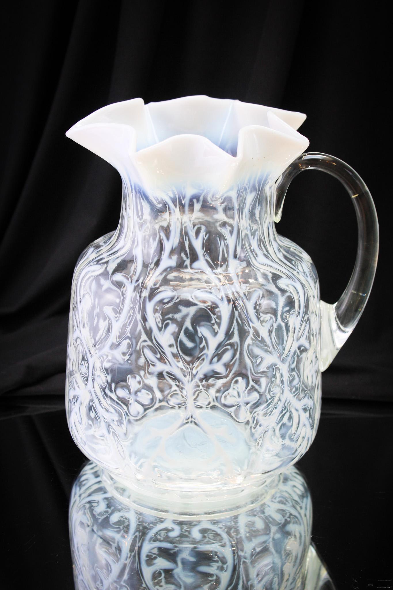 Northwood Opalescent Spanish Lace Victorian Water Pitcher: Striking exmple of a Northwood Spanish Lace pattern pitcher. Excellent example for your collection. Measures 9" tall.