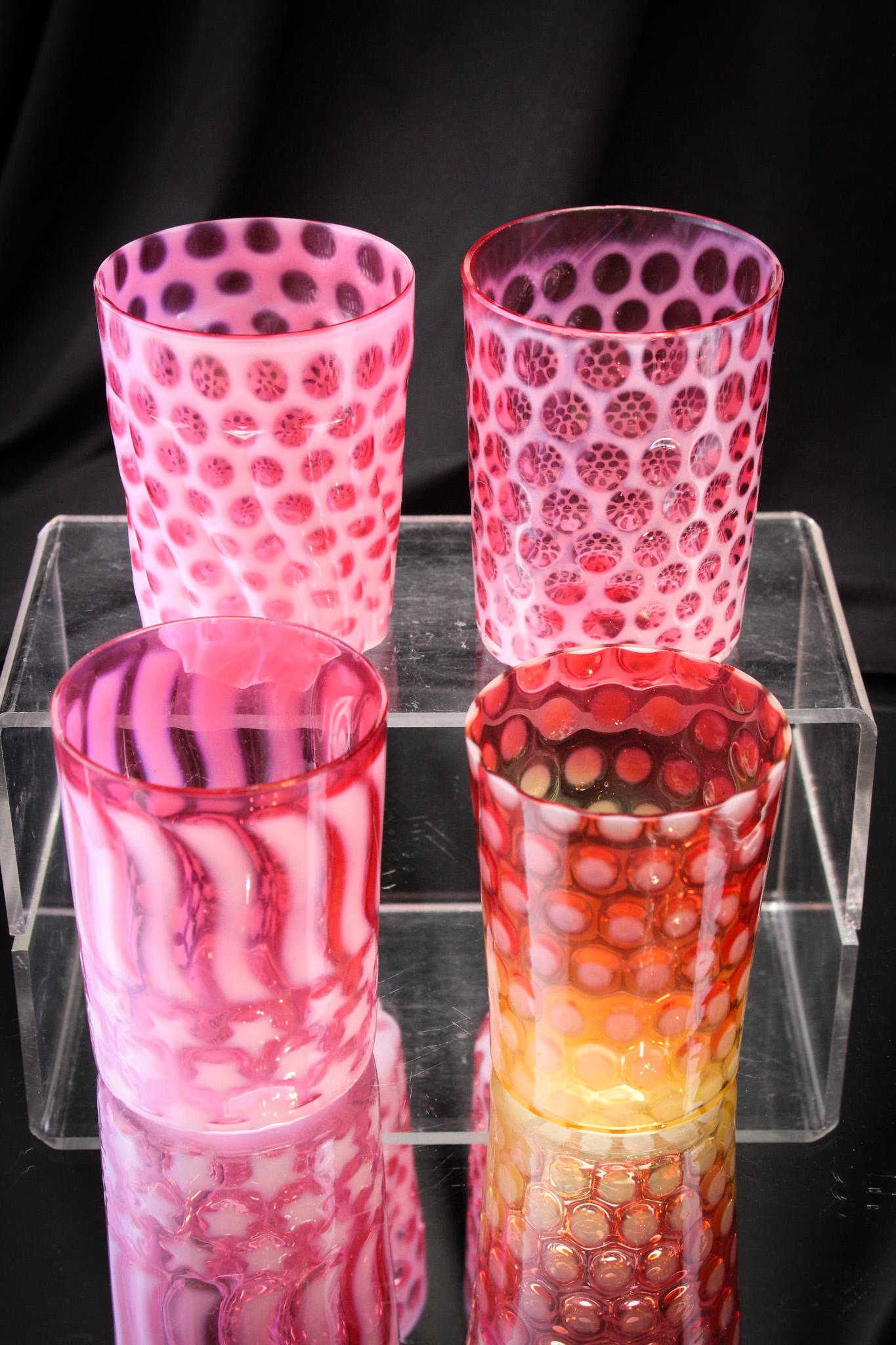 4 pc Lot Victorian Opalescent Art Glass Tumblers: Select offering of four fine examples of Victorian tumblers: One in Amberina Opal Coinspot, a cranberry opal Stars and Stripes, a cranberry Wwindows Swirled and a cranberry Windows plain.