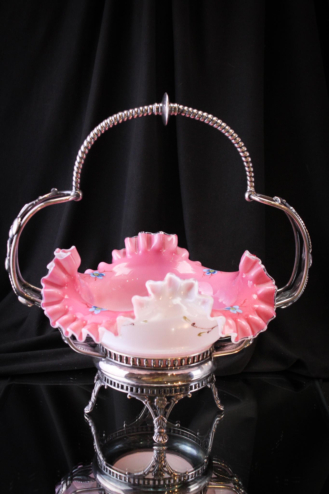 Pairpoint Victorian Silverplate Enameled Glass Brides basket: Lovely Victorian signed Pairpoint silverplate brides basket with cherry adornment complete with cased glass enameled glass brides bowl. Very nice example. Measures 12" tall.