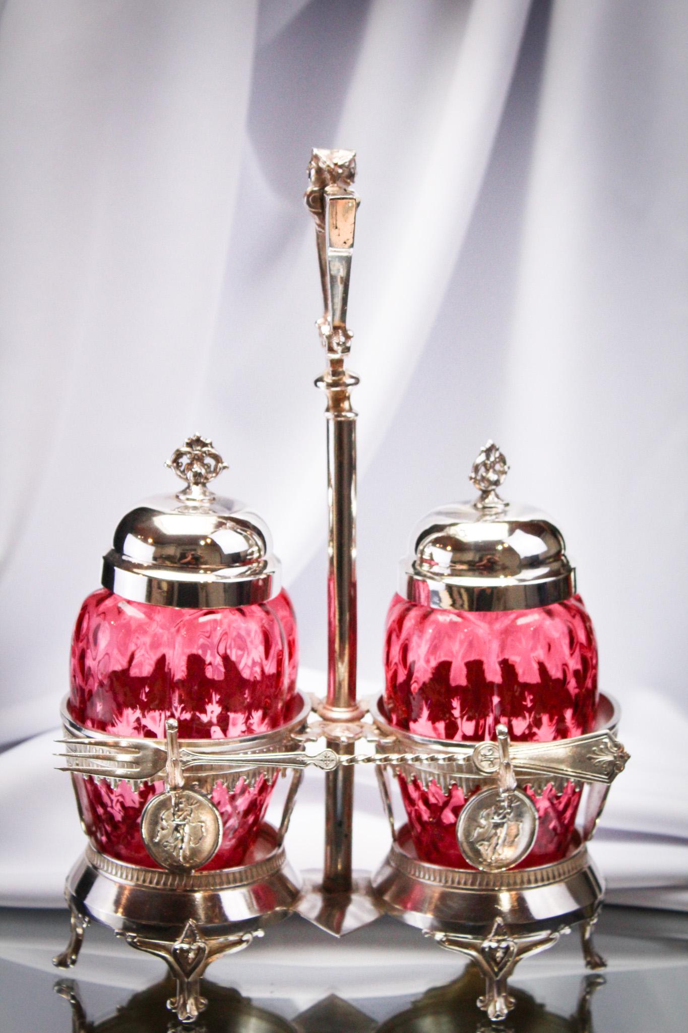Rare Cranberry Huntington Double Silverplate Victorian Pickle Castor: Unusual and very nice Victorian Double cranberry Diamond Quilt pickle castor jars in a signed Huntington silverplate frame. Jars are melon ribbed and such deep cranberry color it makes Mother Magnum e