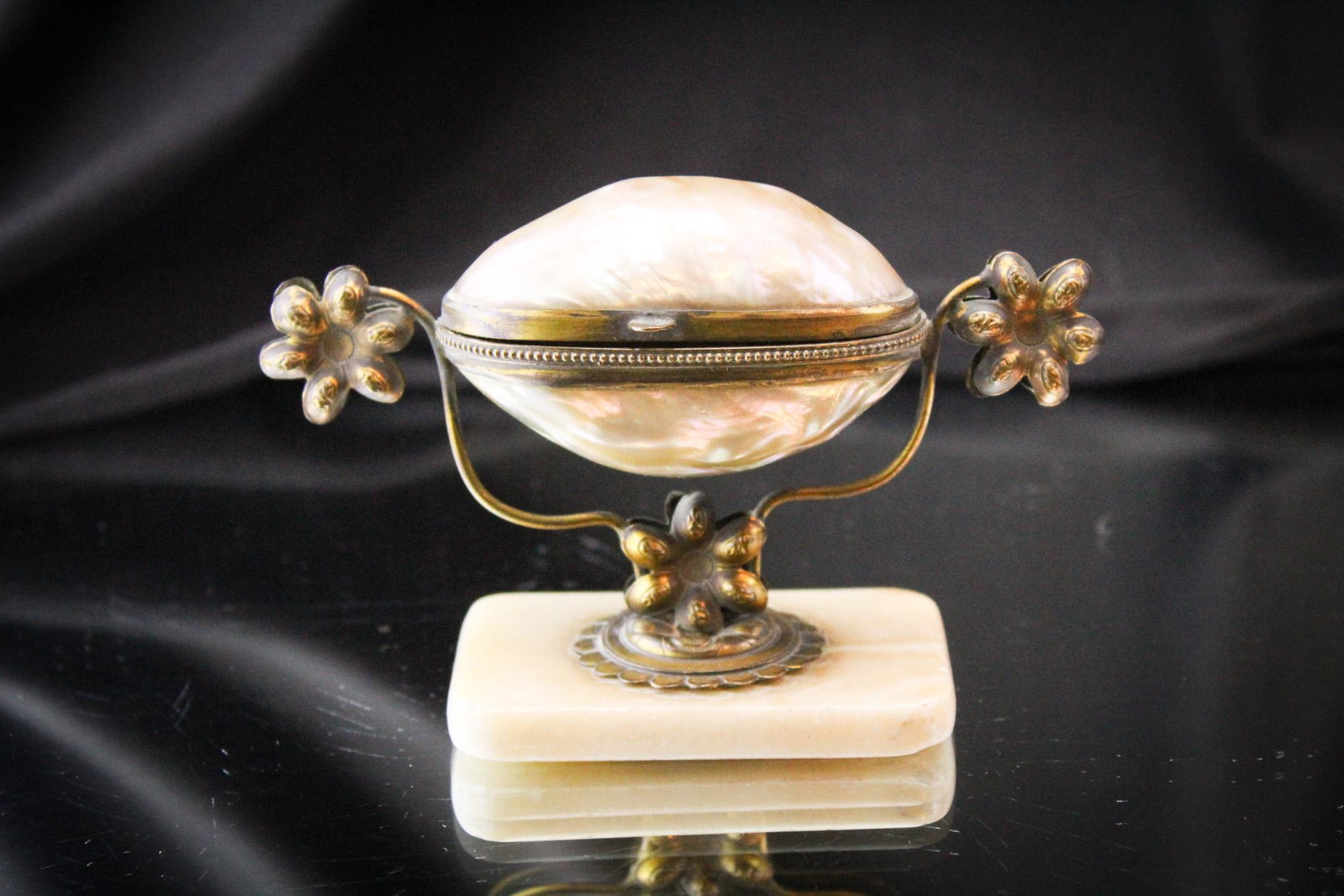 Mother of Pearl Victorian Trinket Jewelry Casket: Victorian mother of pearl, marble, and brass trinket or jewelry casket. Ornate piece with original mountings. Measures 3" by 5".