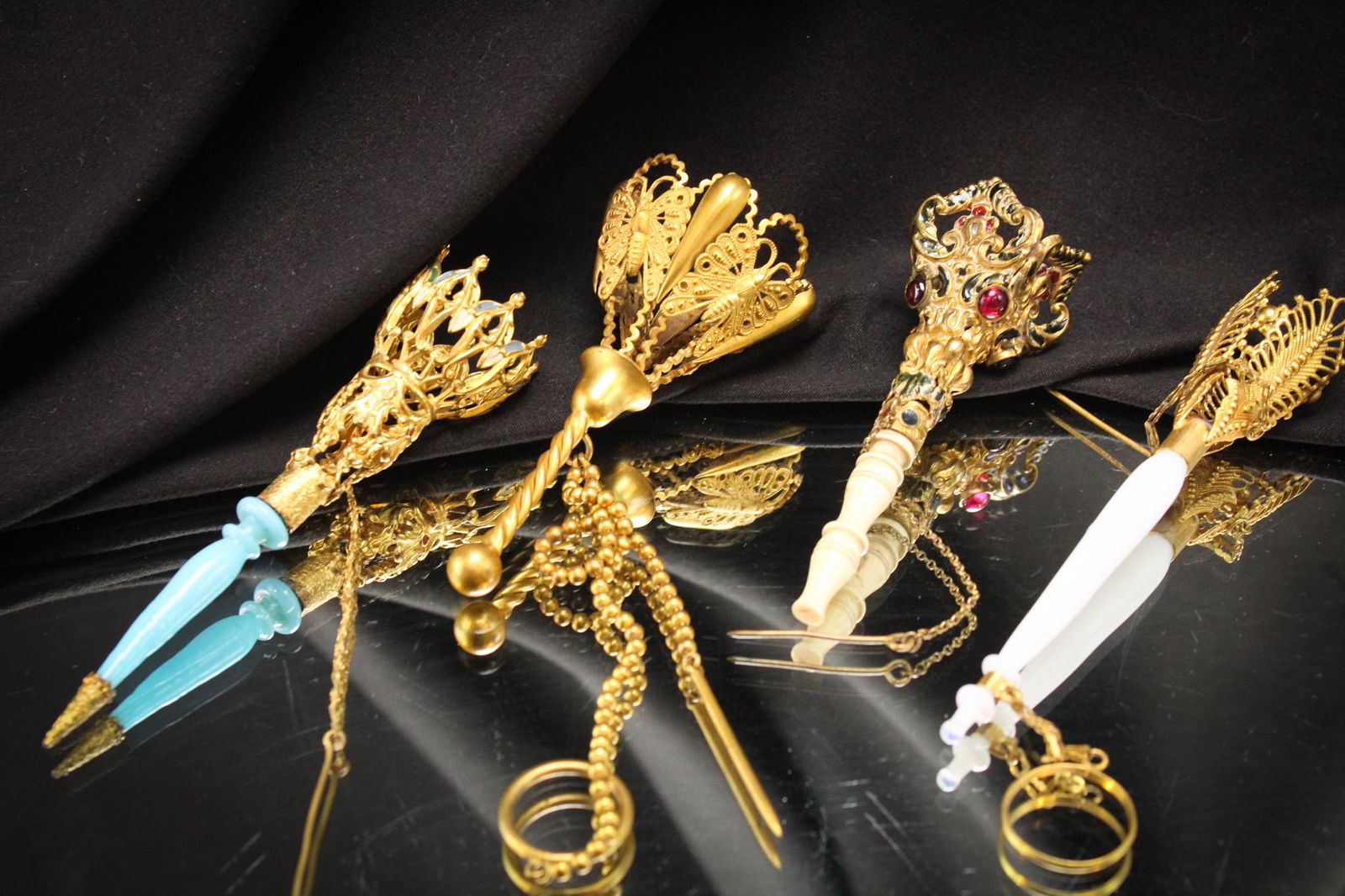 4 pc Lot Victorian Antique Tussy Mussy Bouquet Holders: Buy them when you see them! That's what Mother Magnum says. And when do you see such wonderful Victorian fancies as these? Nice selection of four tussy mussy bouquet holders: One with butterflies, one