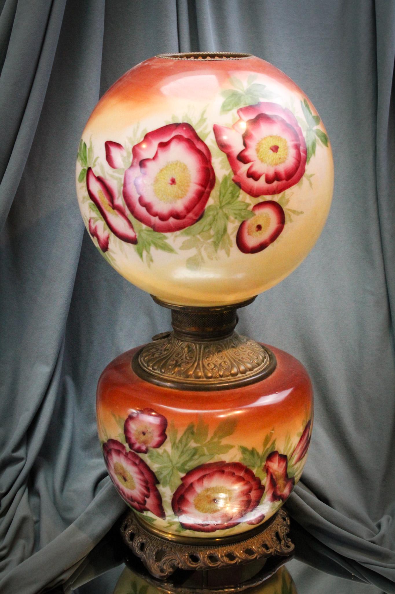 Victorian Gone with the Wind Parlor Oil Lamp: Nice Lamp. Look at the impressionistic morning glory flowers adorning this real gem of a lamp. Makes your heart skip a beat, doesn't it? Fine example with vibrant earth toned colors. It stands, hold o