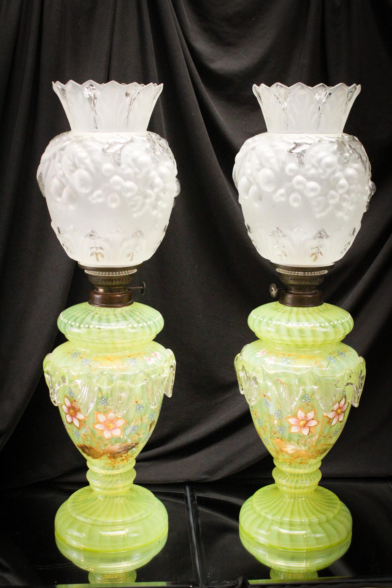 Monumental 25" Pr. Vaseline Opalescent Stripe Decorated Mantle Hurricane Oil Lamps: How magnificent are these wonderful lamps? Huge measuring 25" tall to the top of the shade pair of Vaseline opalescent stripe oil lamps. Lamps retain original shade and drop in matching glass fonts. B