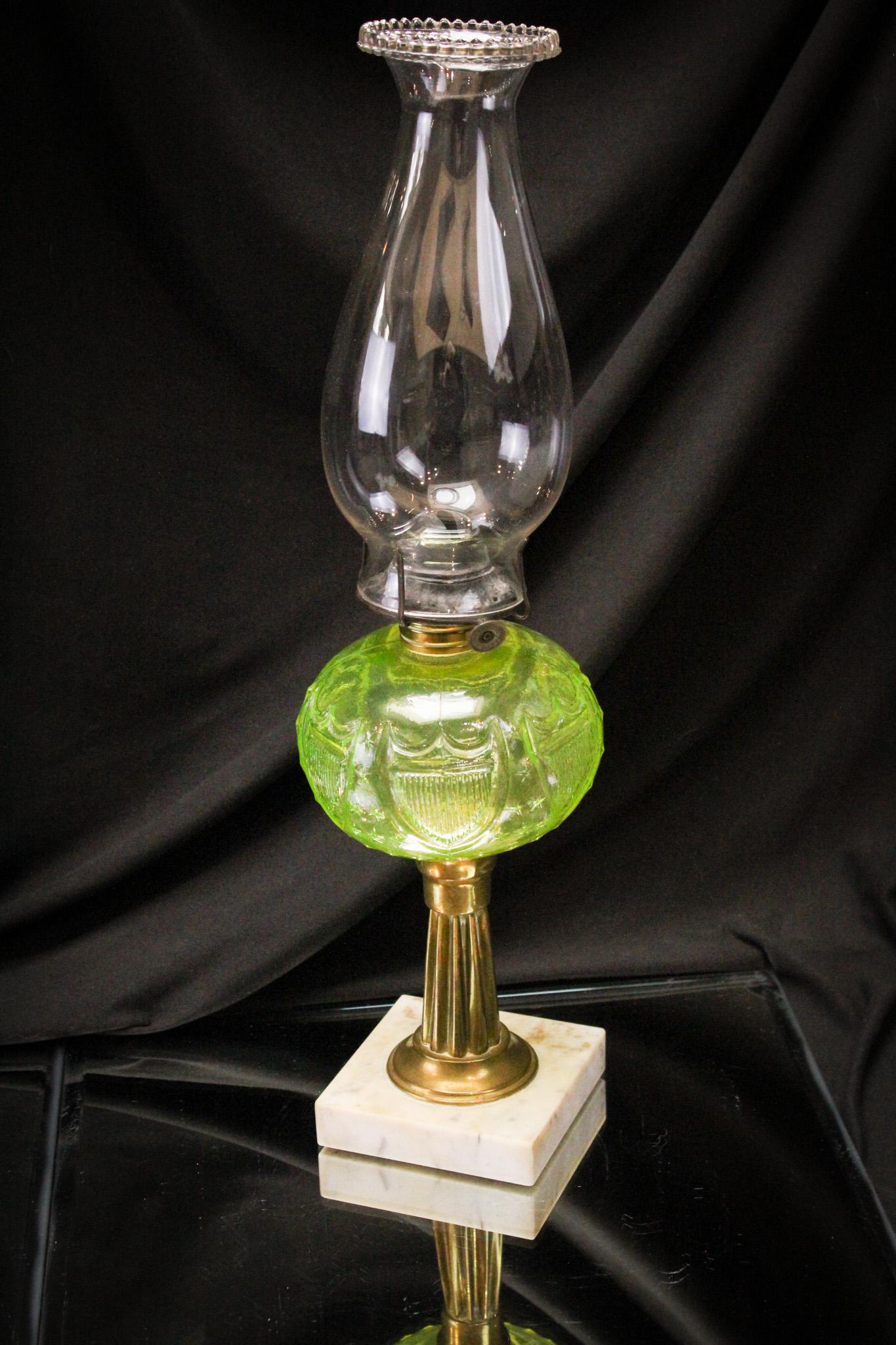 Vaseline Shield Victorian Pattern Glass Oil Lamp: Scarce Victorian vaseline pattern glass shield oil lamp complete with marble base. Fine example. Measures 10" tall.
