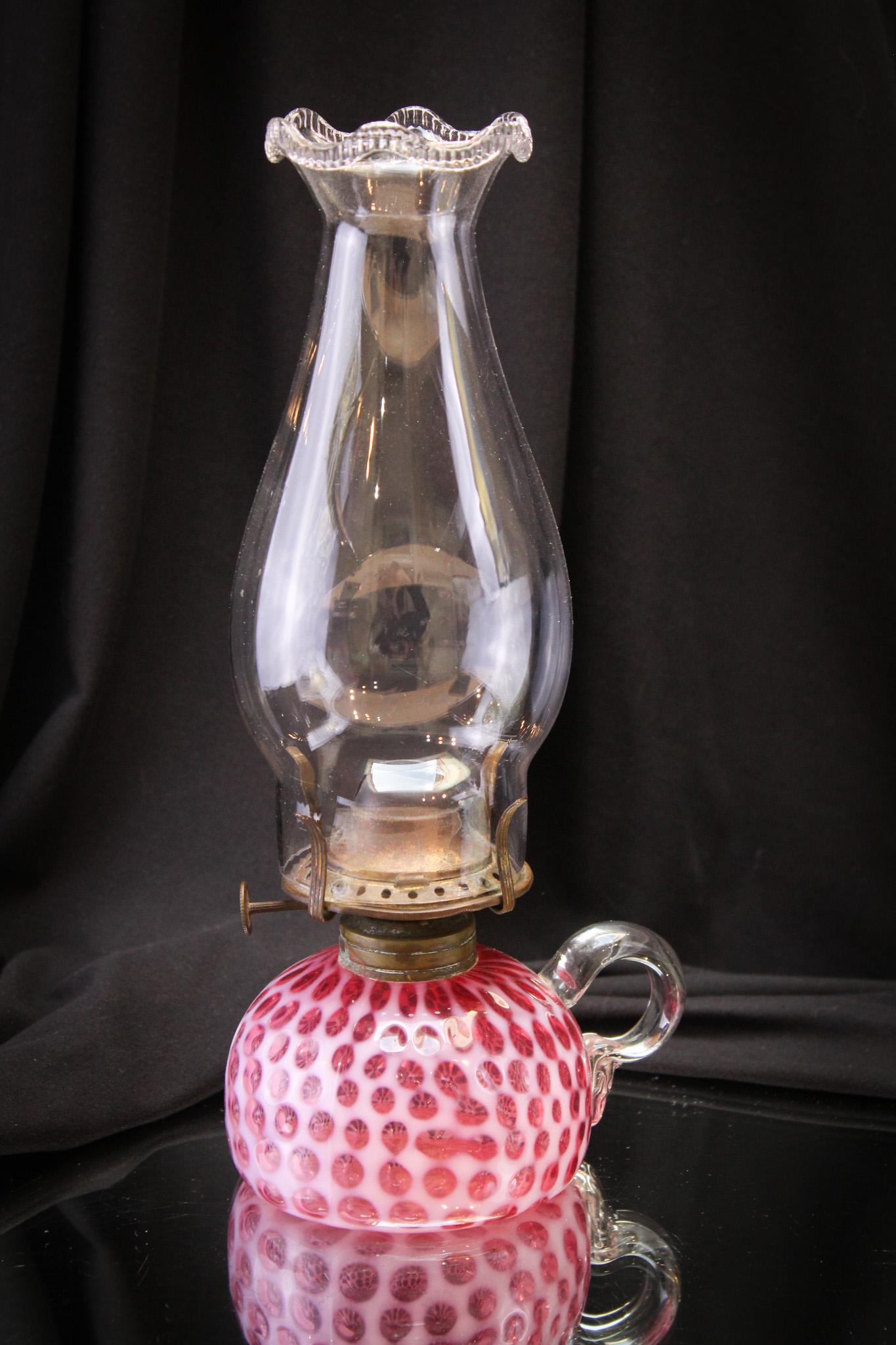 Cranberry Opalescent Hobb's Windows Victorian Oil Lamp: Deep rich cranberry coloring and crisp white opalescence make this one truly fine example of a Victorian oil lamp. Lamp measures 2 1/2" tall to the collar.