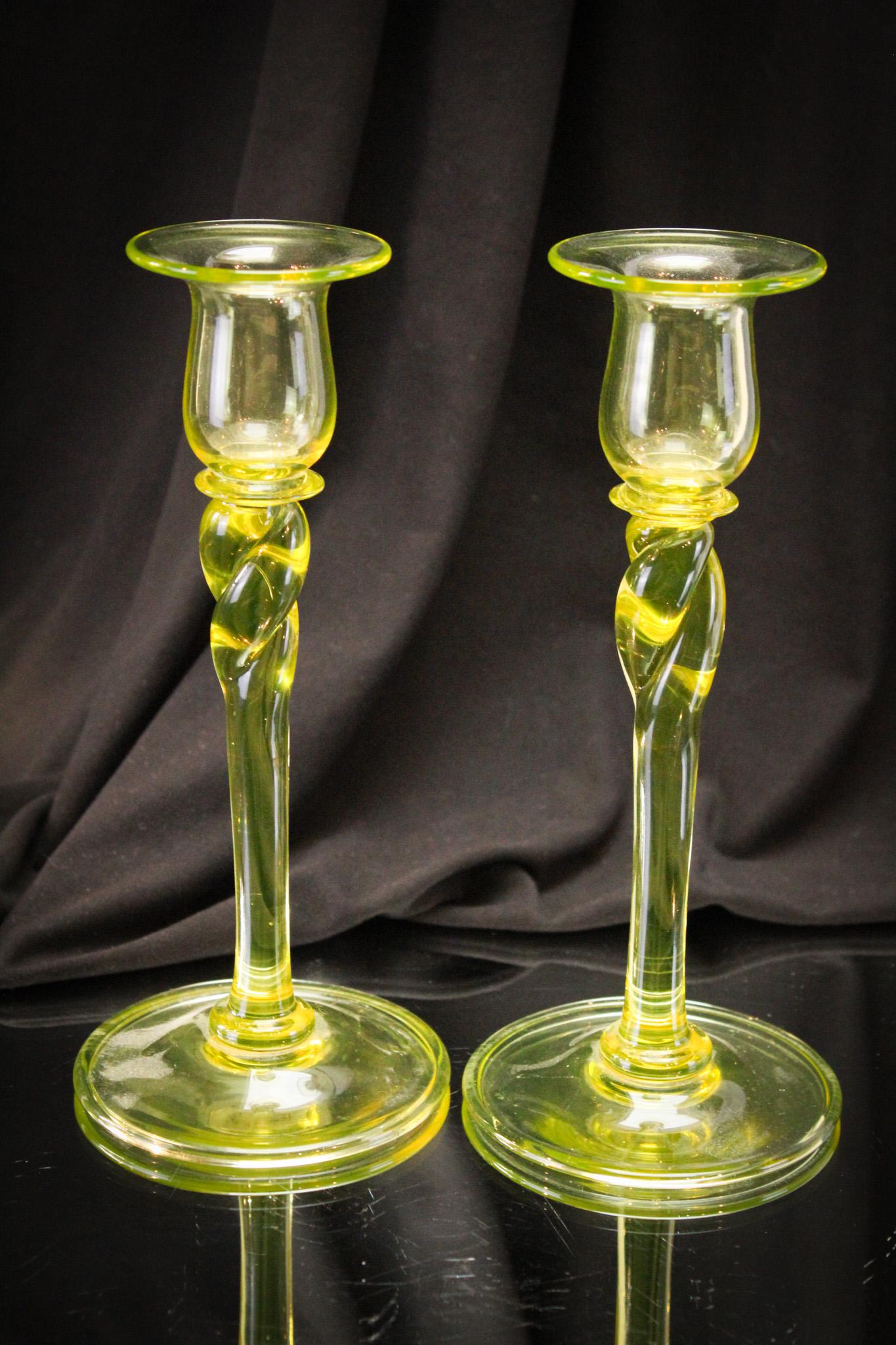 Pair Steuben Glass Vaseline Twist Candlesticks Rockwell Gallery: The bright light of your table tonight. This pair of Steuben vaseline candlesticks in classic twist form are sure to compliment any area in your home or collection. Complete with Rockwell Galleries st