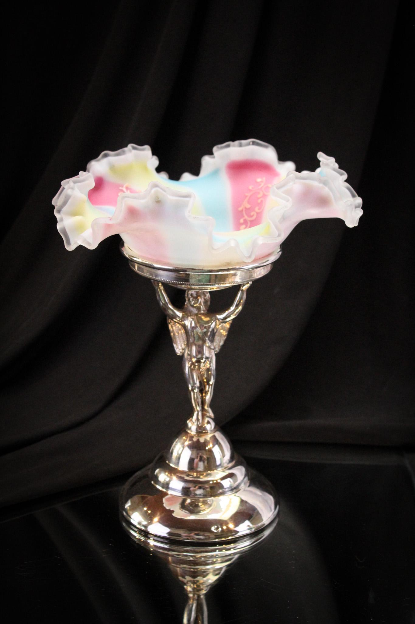 Rainbow Art Glass New Amsterdam Silverplate Victorian Brides Bowl: Lovely rainbow stripe Victorian Brides bowl in signed New Amsterdam silverplate figural cherub holder. Nice rich coloring to this piece. Silverplate is very nice. Measures 9 3/4" tall.