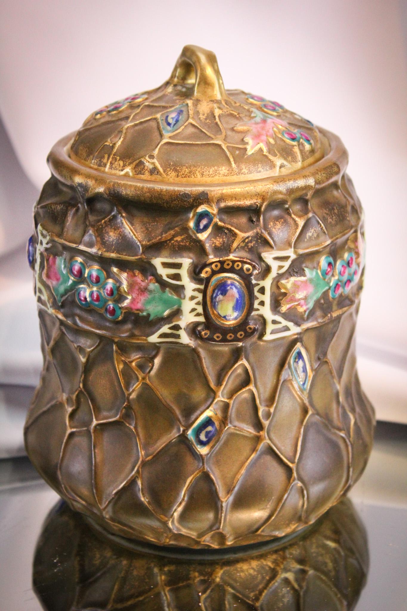 Nippon Amphora Style Jeweled Humidor: Super example of a Nippon in the style of Amphora with jeweled decoration. Jewels are actually part of the porcelain. Humidor is complete with blue mark. Piece measures 7 1/2" tall.