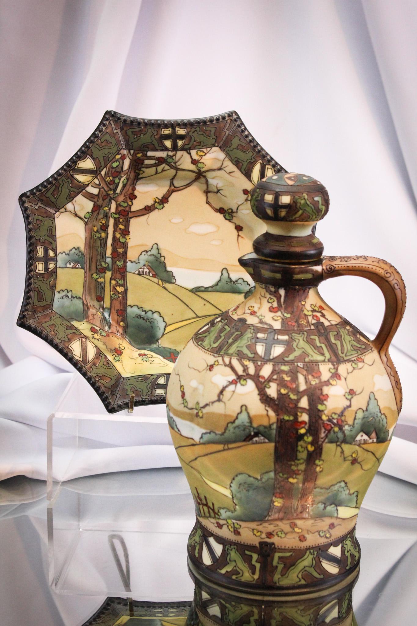 2 pc Nippon Porcelain Landscape Whisky & Bowl: Beautiful signed with blue mark Nippon landscape decoration whisky jug and accompanying bowl in the matching pattern. Tallest measures 9 1/2" tall.