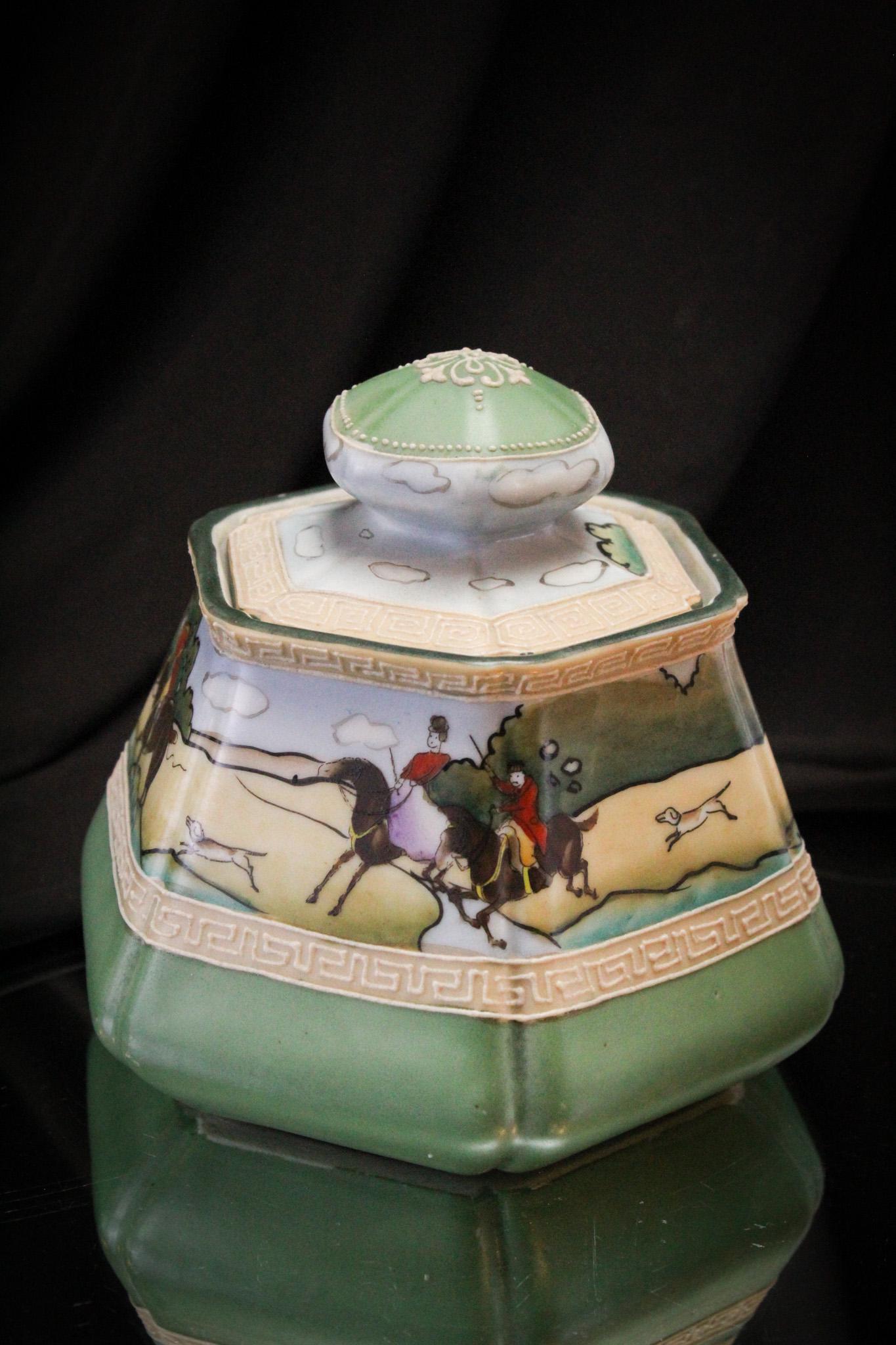 Nippon English Hunting Scene Blue Mark Humidor: Wonderful signed Nippon blue mark Nippon Humidor with English Hunting scene decoration. Fine example measuring 5 1/2" tall.