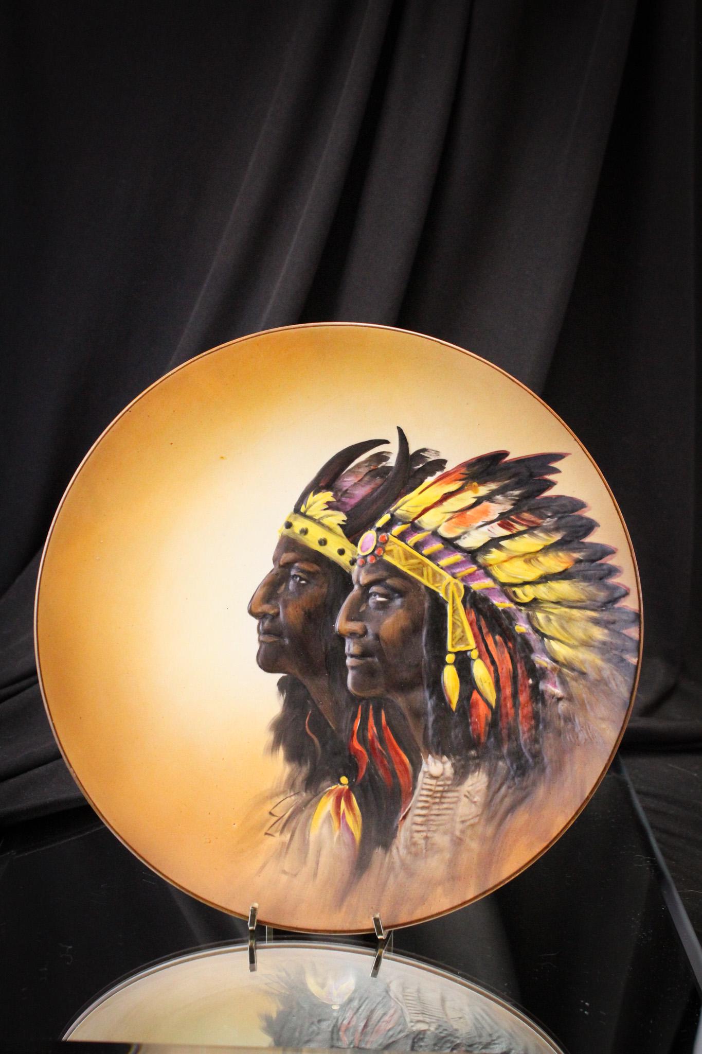 Nippon Blown Out Indians Green Mark Plate: Nippon did it well with this blown out plate featuring indians. Signed with a green mark. Plate measures 10 3/4" in diameter.